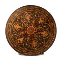 A Continental Parcel Ebonized Marquetry Center Table