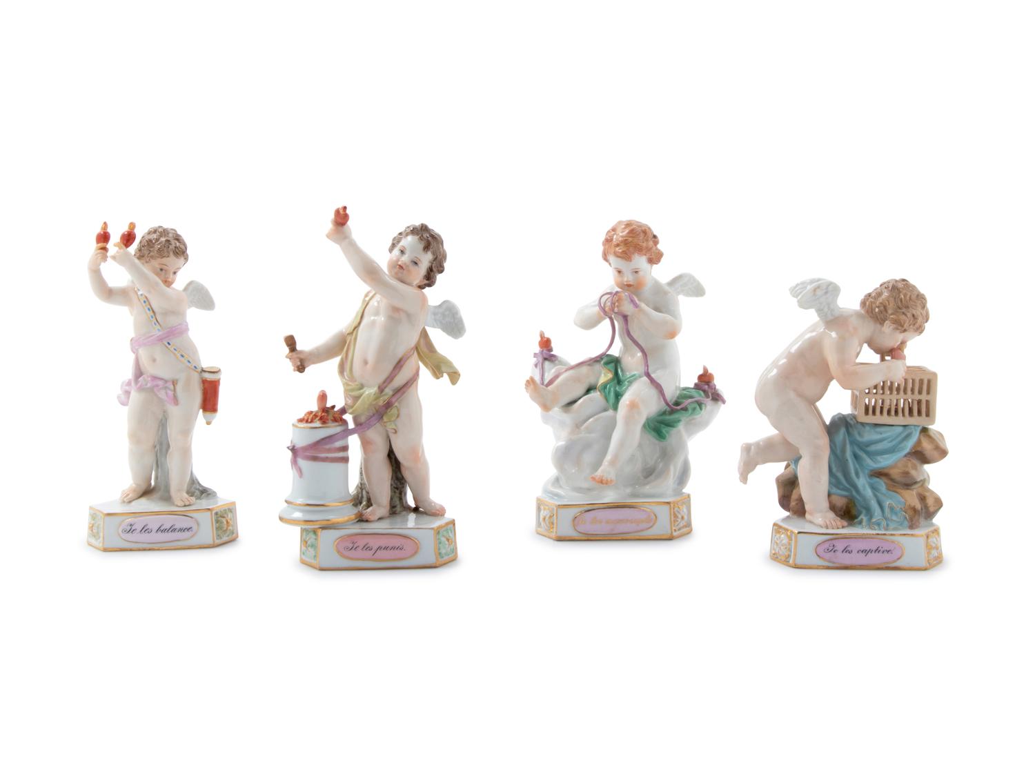 Four Meissen Painted and Parcel Gilt Porcelain Motto Figures