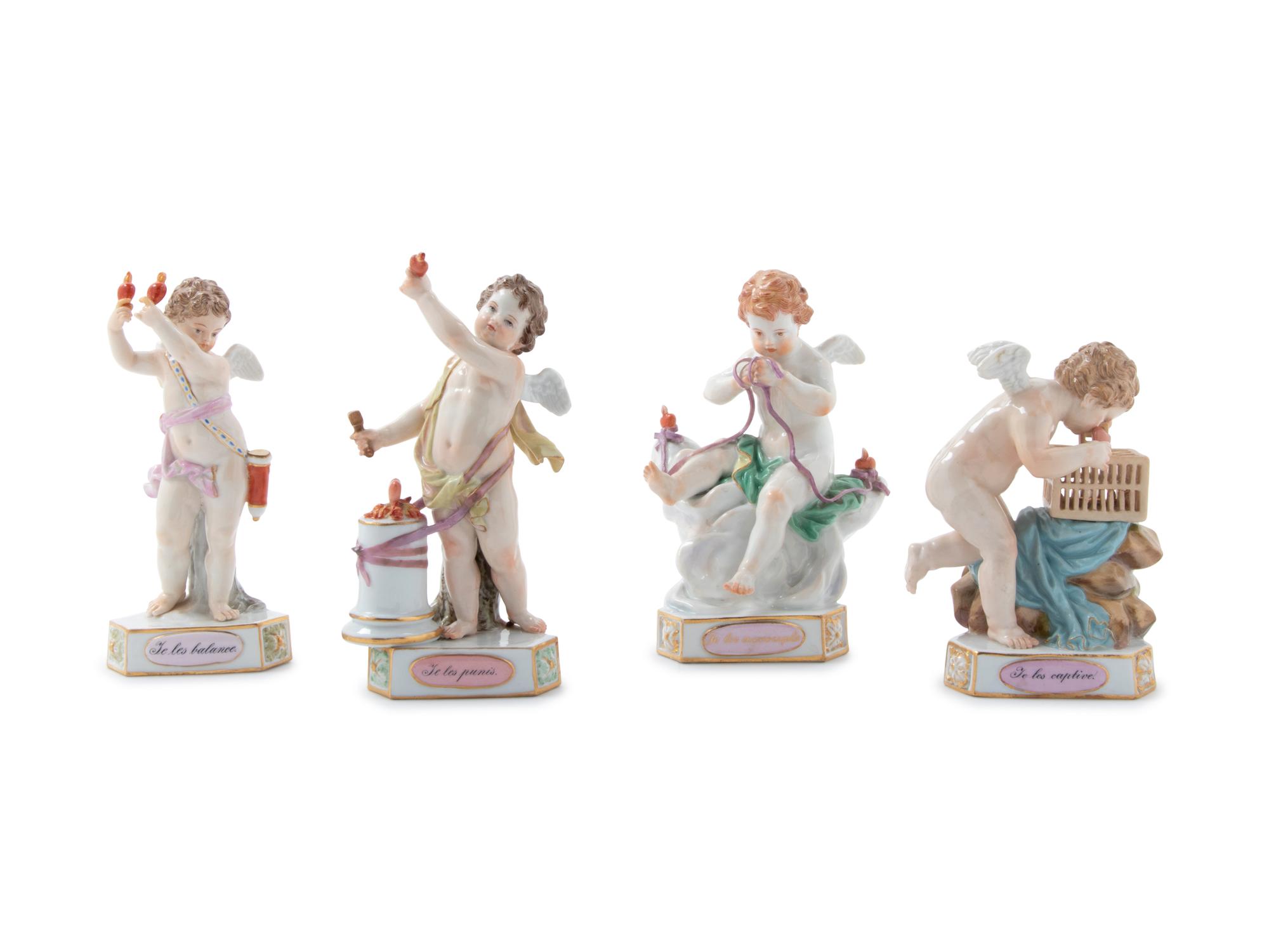 Four Meissen Painted and Parcel Gilt Porcelain Motto Figures