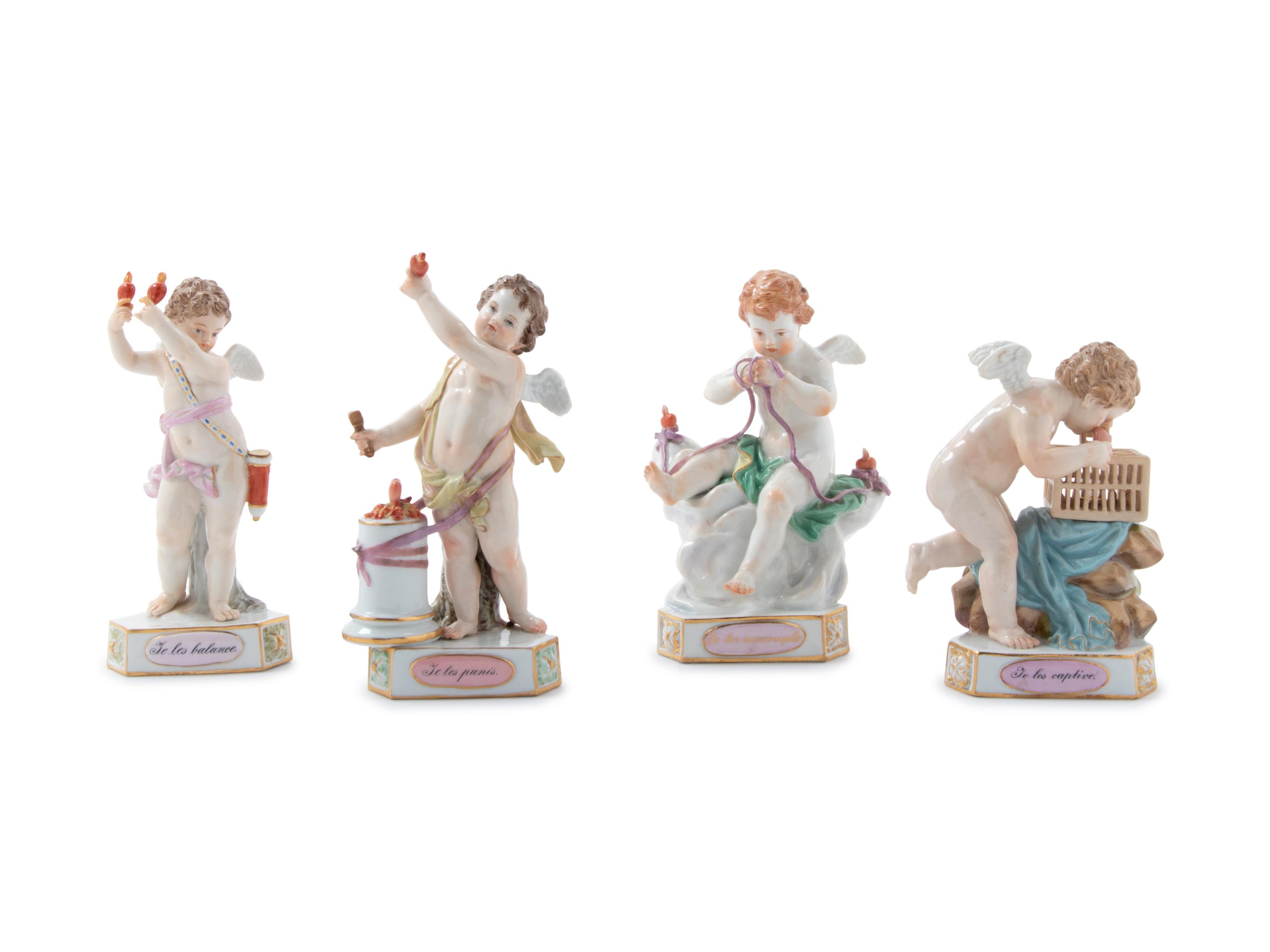 Four Meissen Painted and Parcel Gilt Porcelain Motto Figures