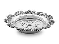 having a foliate decorated rim, with insert.