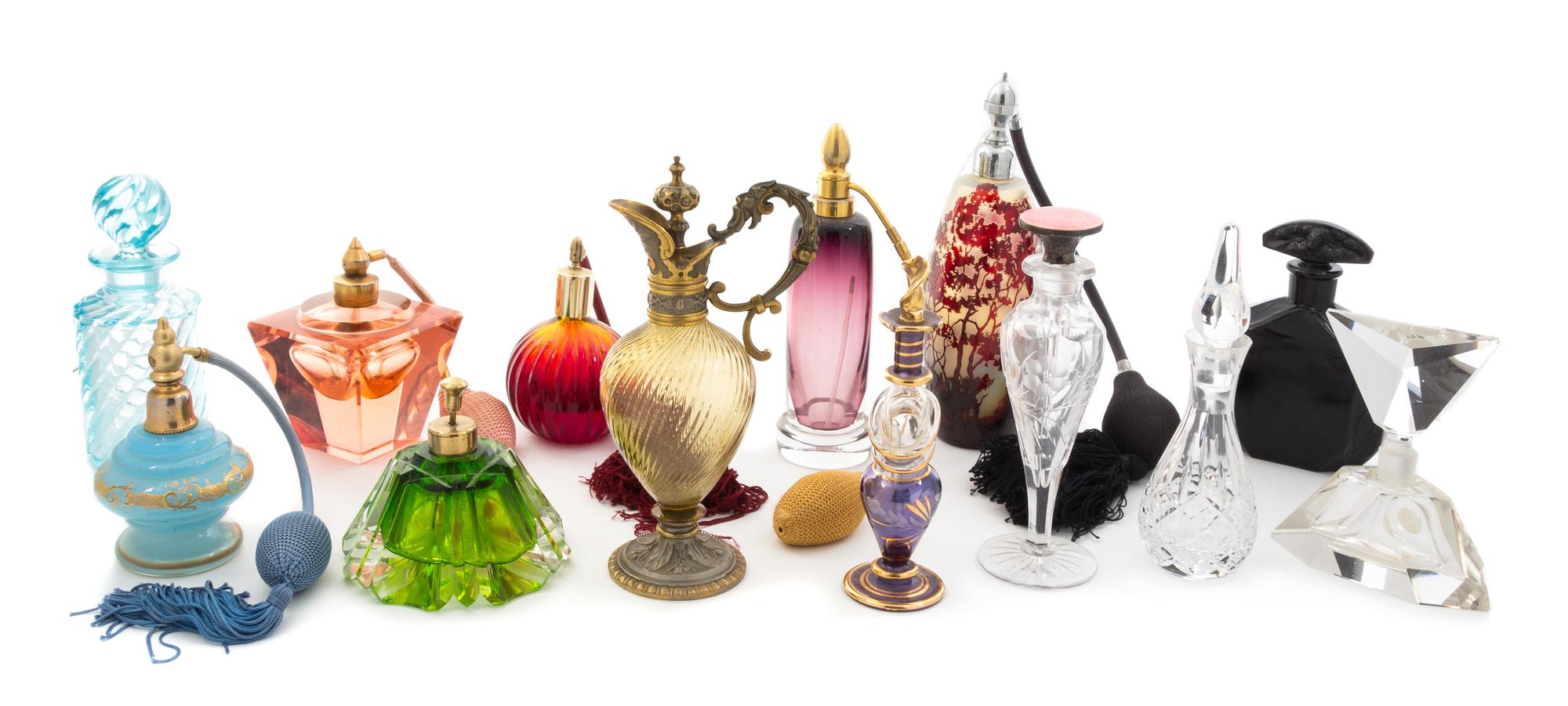 A Collection of Glass Perfume Bottles Height of tallest 8 1/4 inches.