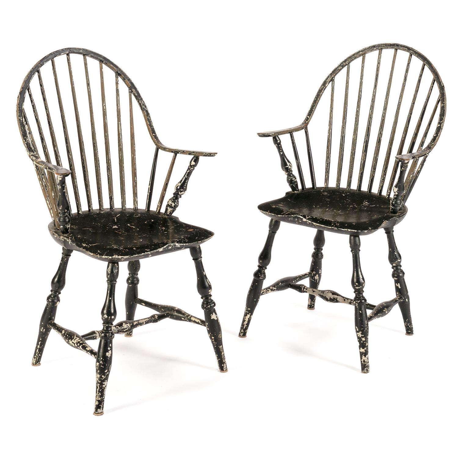 A Pair of Black-Painted Continuous Arm Windsor Chairs