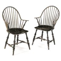 A Pair of Black-Painted Continuous Arm Windsor Chairs