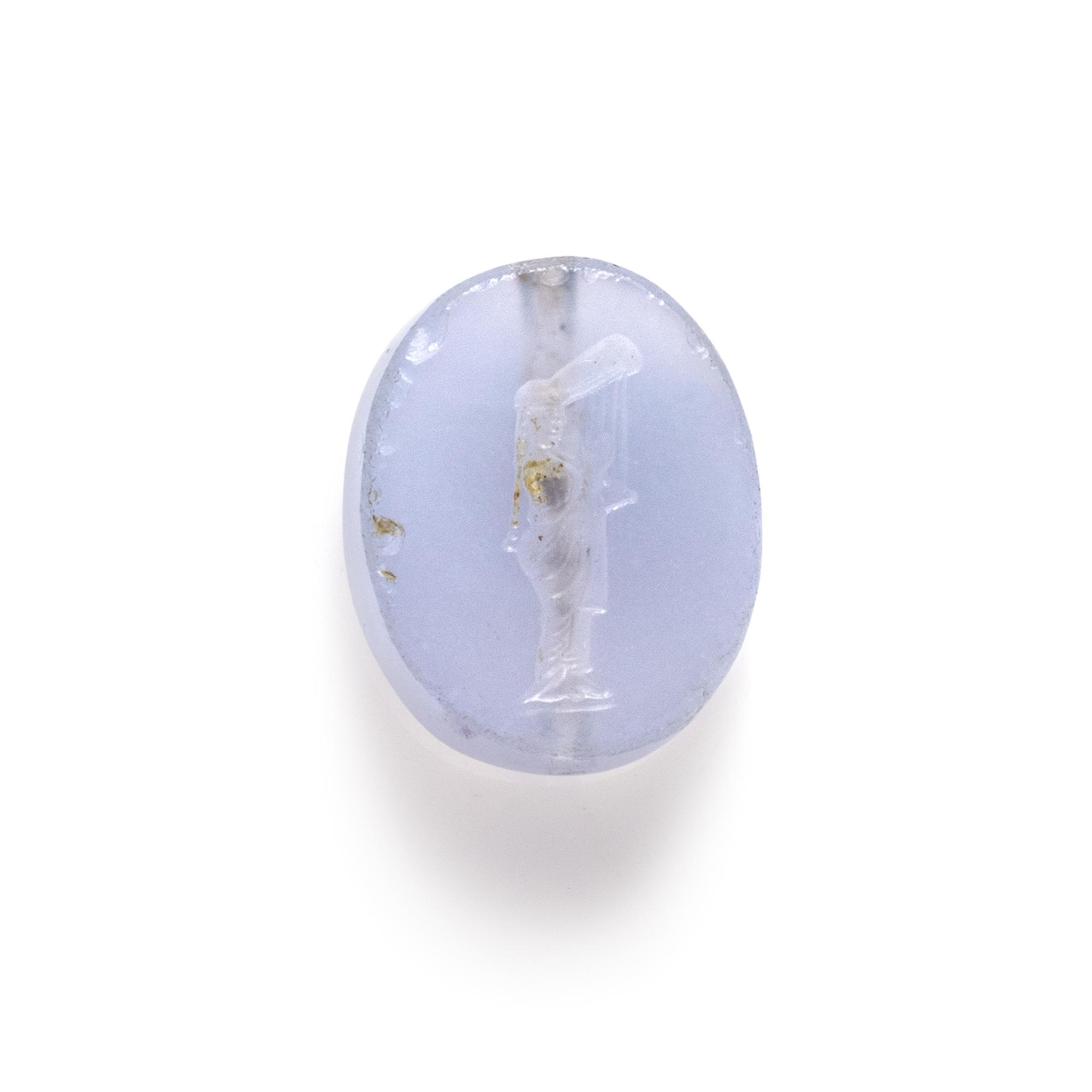 A Greco-Persian Pale Blue Chalcedony Scaraboid with a Muse Playing a Lyre