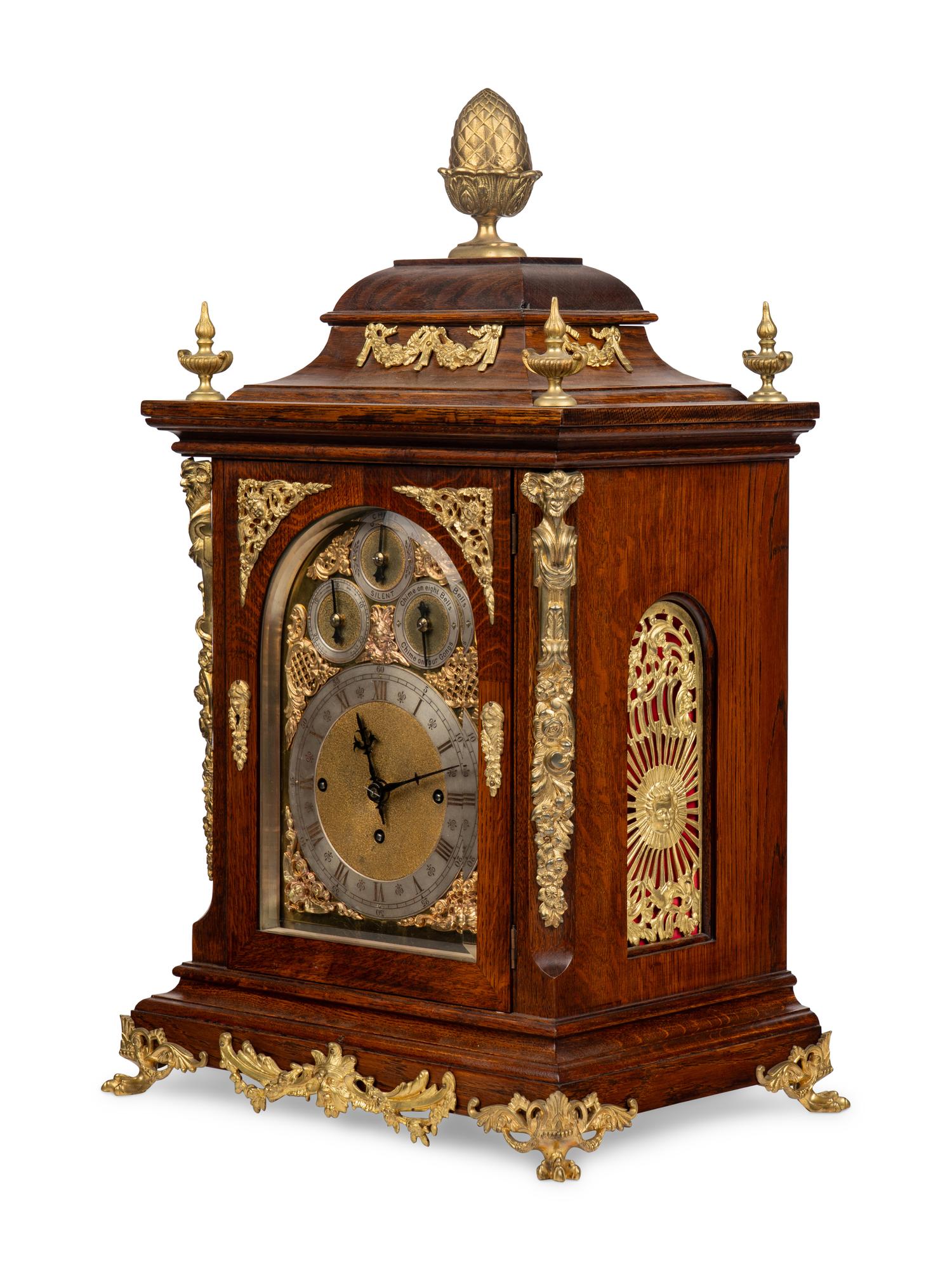 A George II Style Gilt Bronze Mounted Oak Bracket Clock