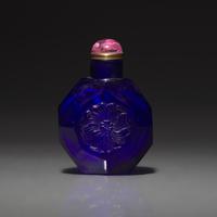 A Chinese Carved Cobalt Blue Glass Snuff Bottle, 18th Century 清中期 寶石藍料刻花鼻烟壺