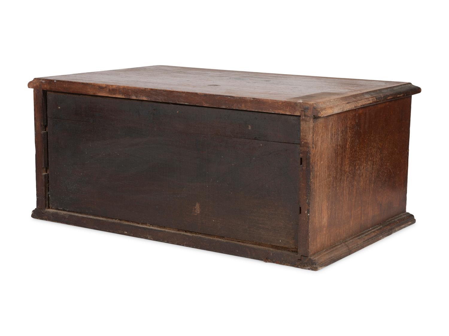 A Thomas Russell Painted Wood Spool Cabinet