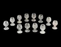 A Set of Twelve Carved Rock Crystal Cups