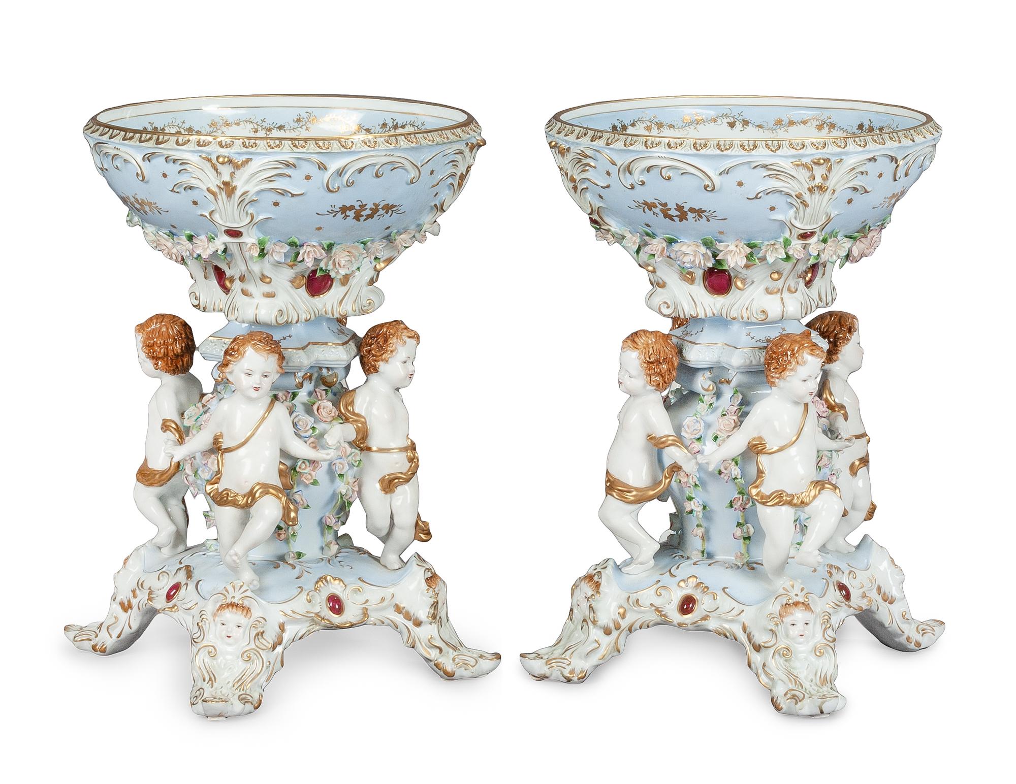 A Pair of German Porcelain Figural Compotes Height 20 x diameter 14 1/2 inches.