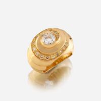 A diamond, colored diamond, and eighteen karat gold ring