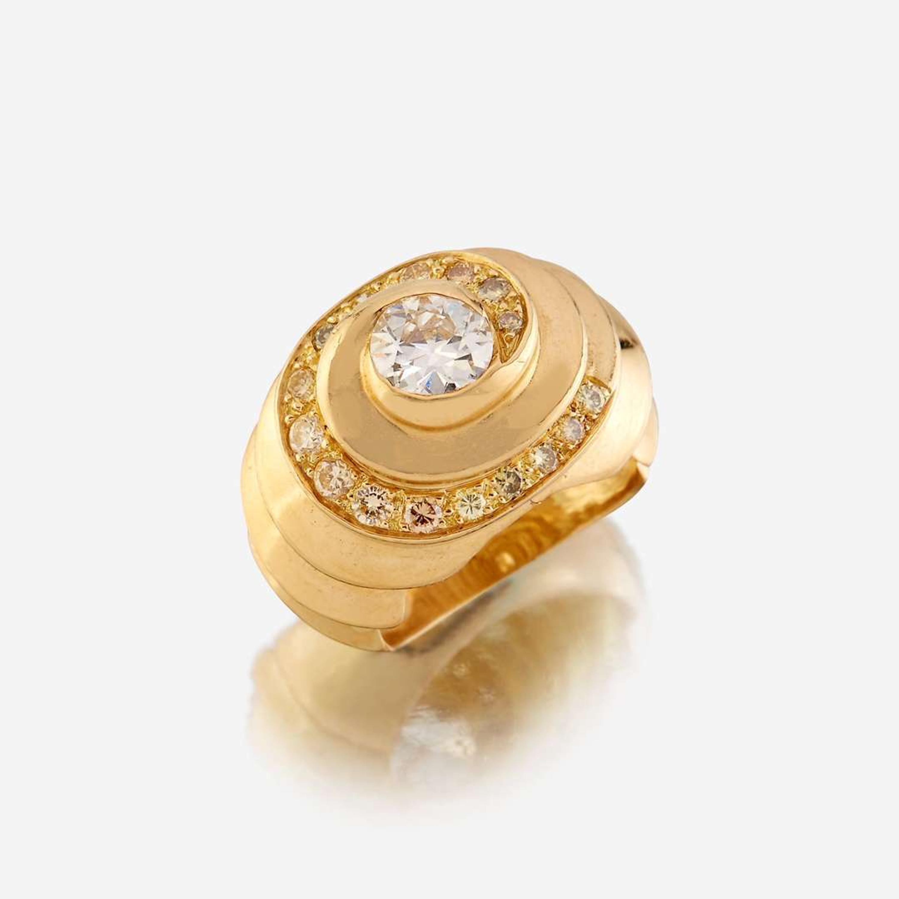 A diamond, colored diamond, and eighteen karat gold ring
