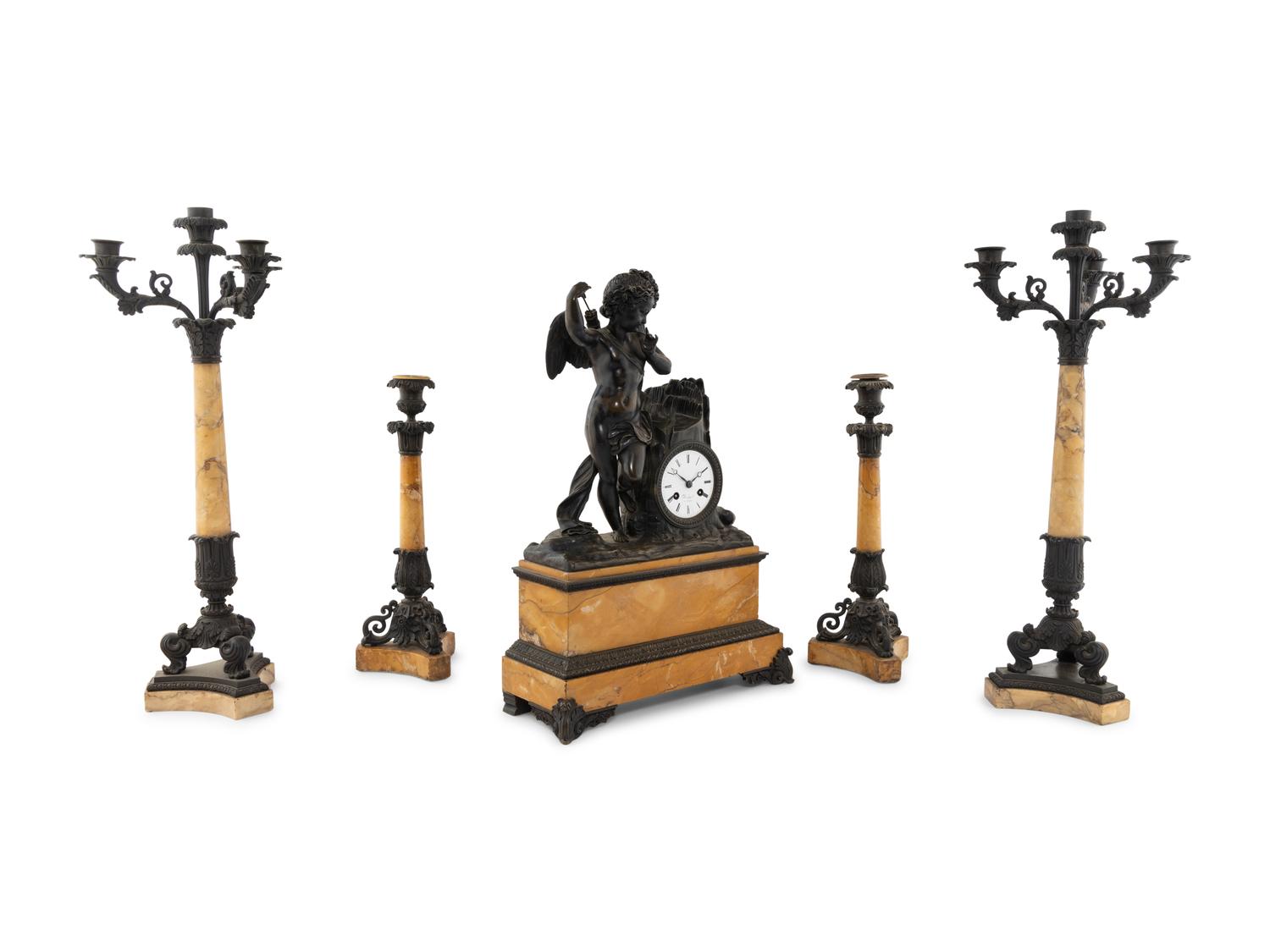 An Assembled French Marble and Bronze Five-Piece Clock Garniture