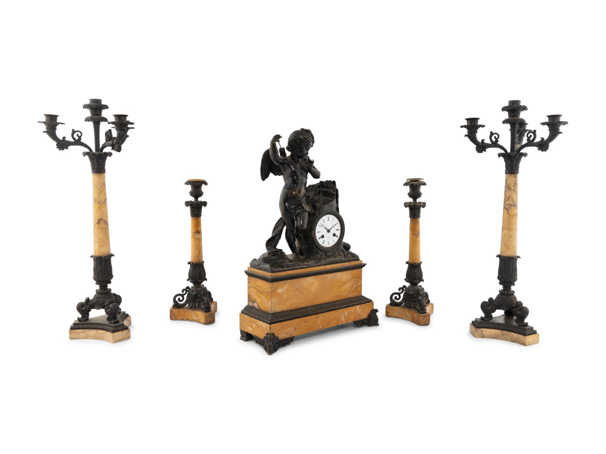An Assembled French Marble and Bronze Five-Piece Clock Garniture