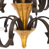A Paul Ferrante Iron and Giltwood Chandelier