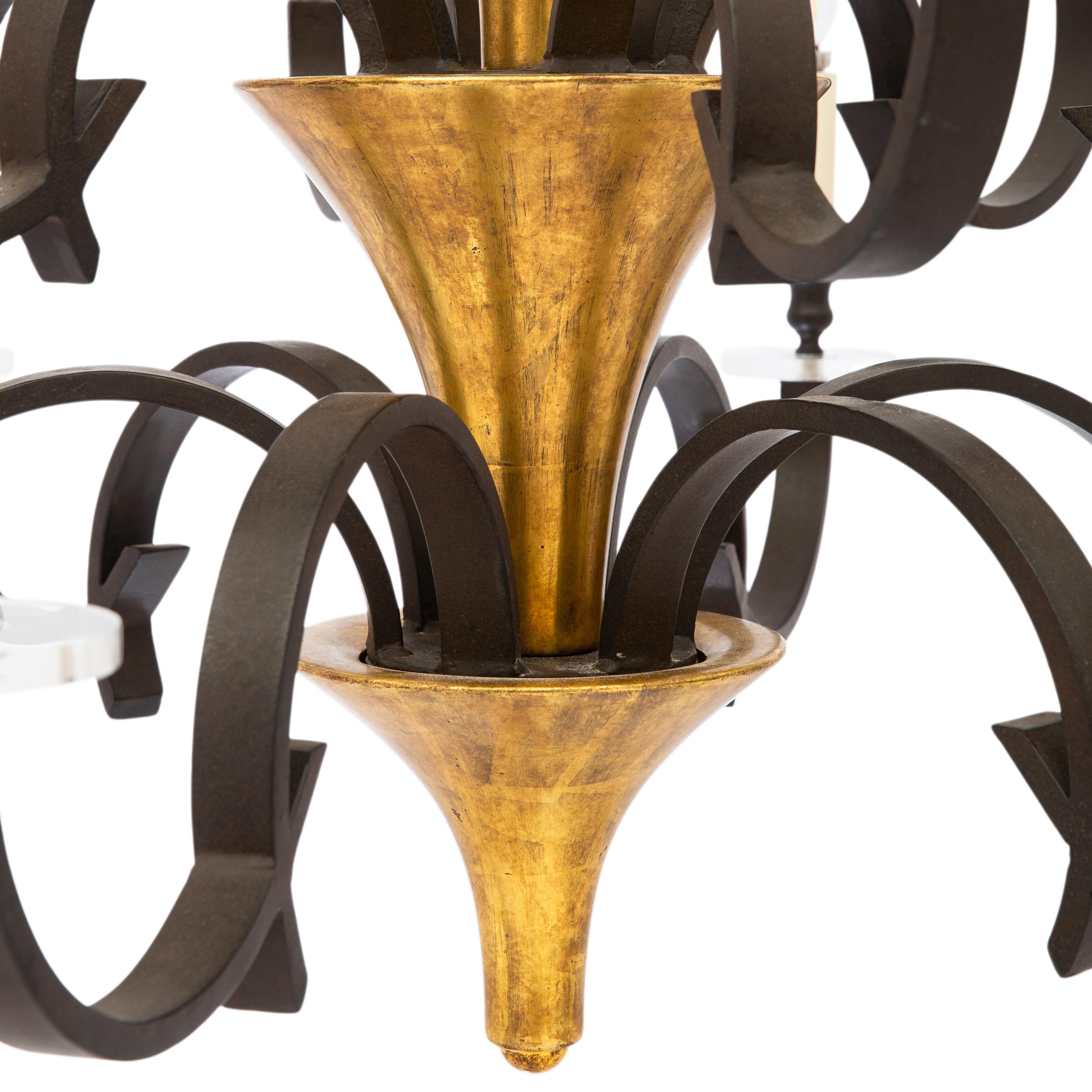A Paul Ferrante Iron and Giltwood Chandelier