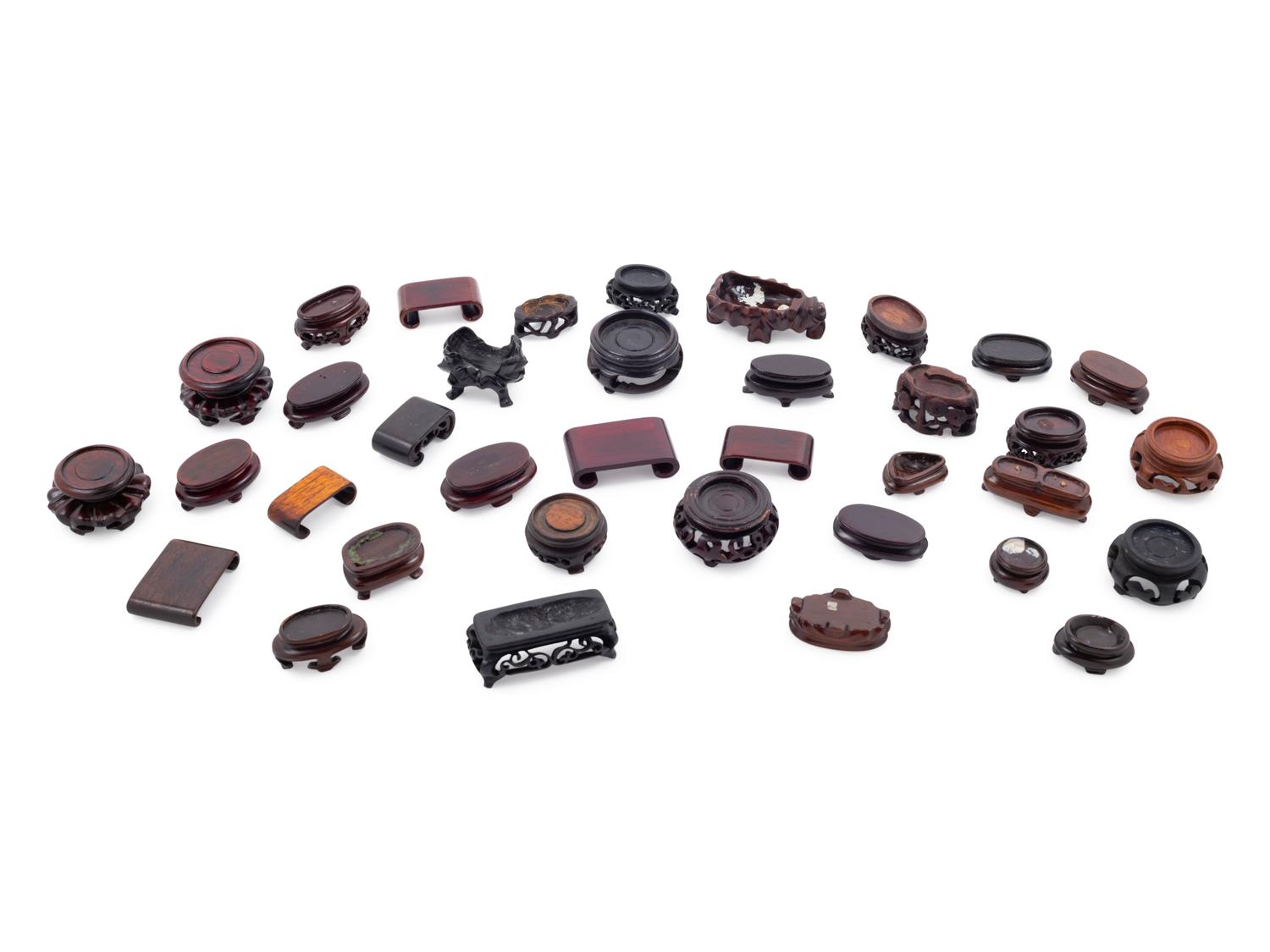 Thirty-Six Chinese Small Hardwood Snuff Bottle Stands