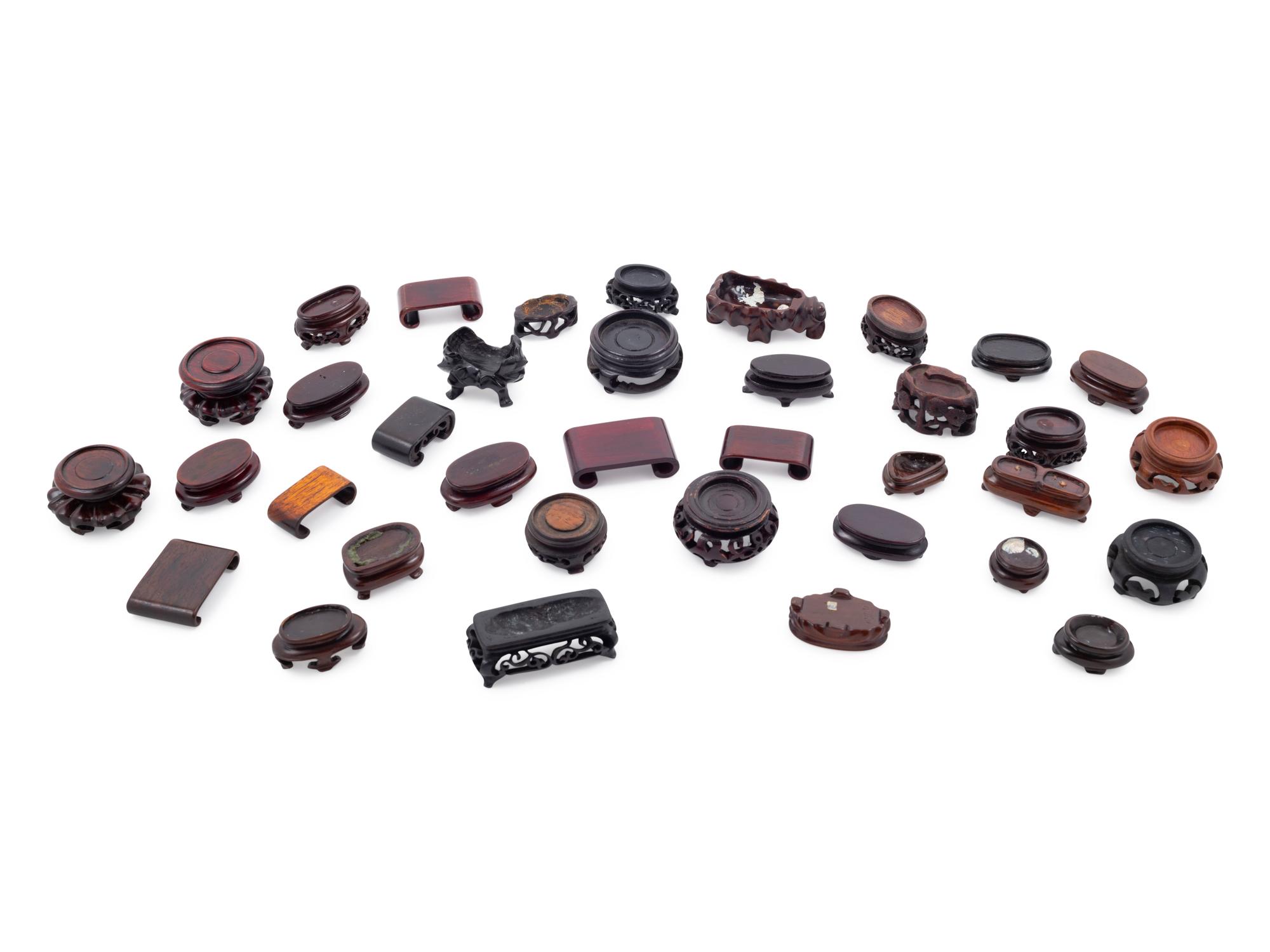 Thirty-Six Chinese Small Hardwood Snuff Bottle Stands