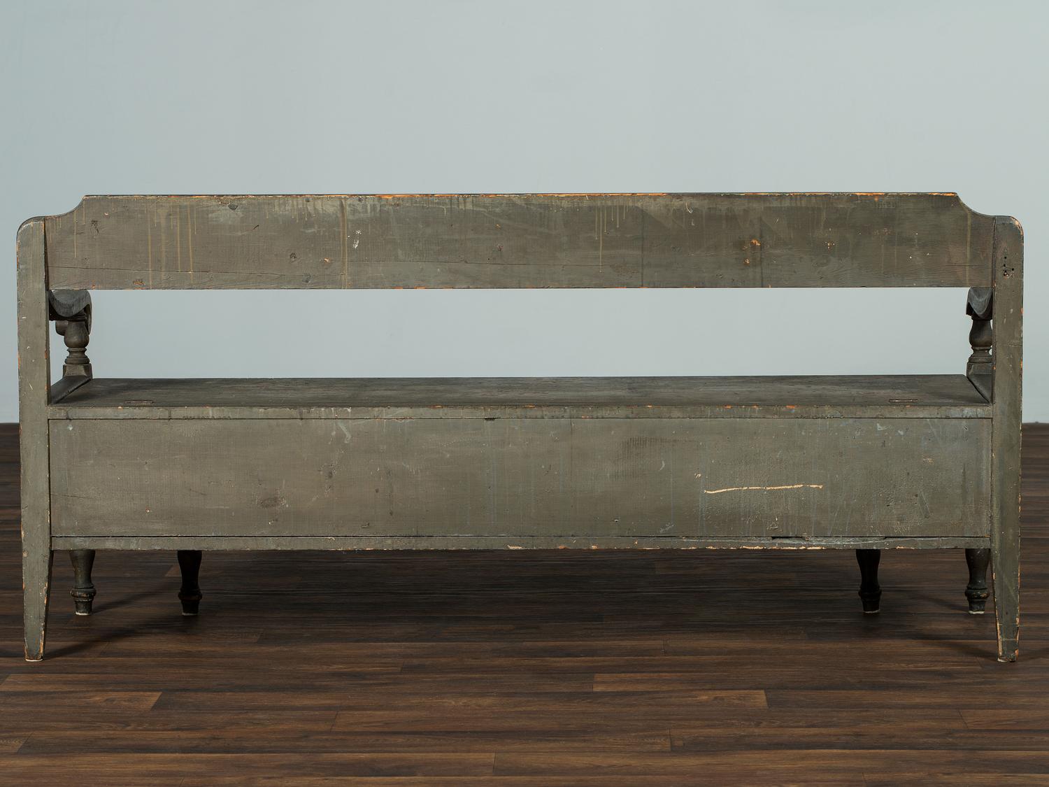 A Swedish-American Green Painted Pine Country Tavern Bench and Trundle Bed
