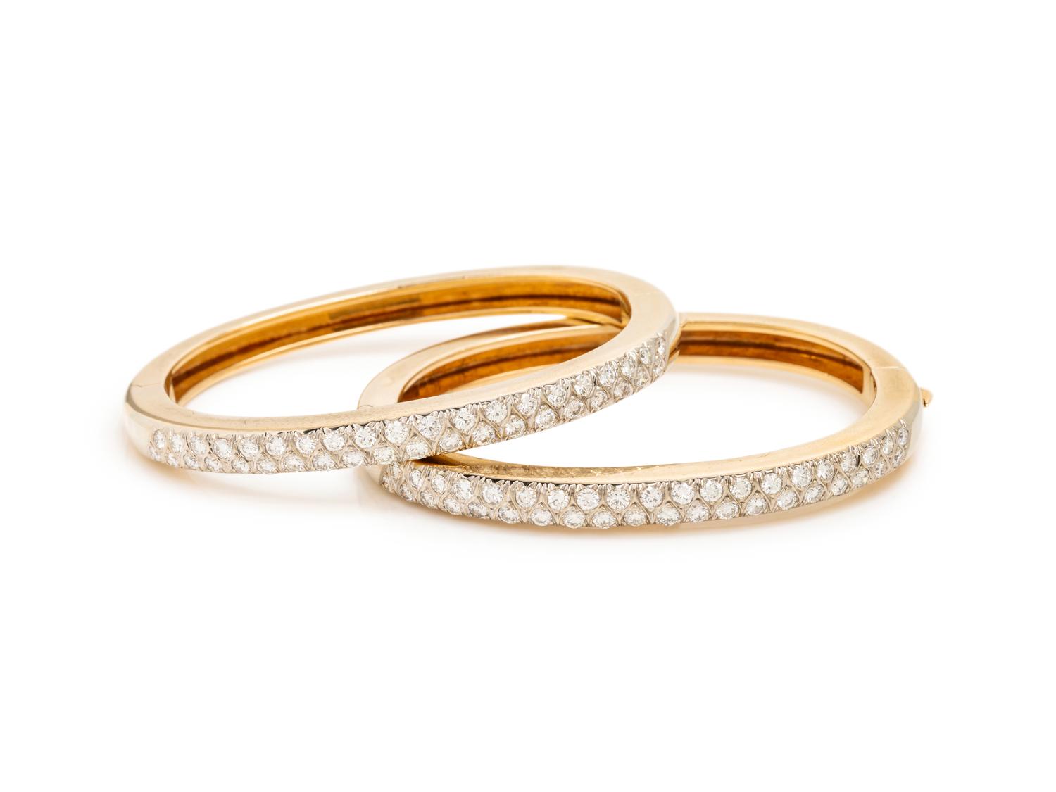 PAIR OF BICOLOR GOLD AND DIAMOND BANGLE BRACELETS