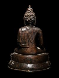 A Tibetan Bronze Figure of Seated Buddha Akshobhya