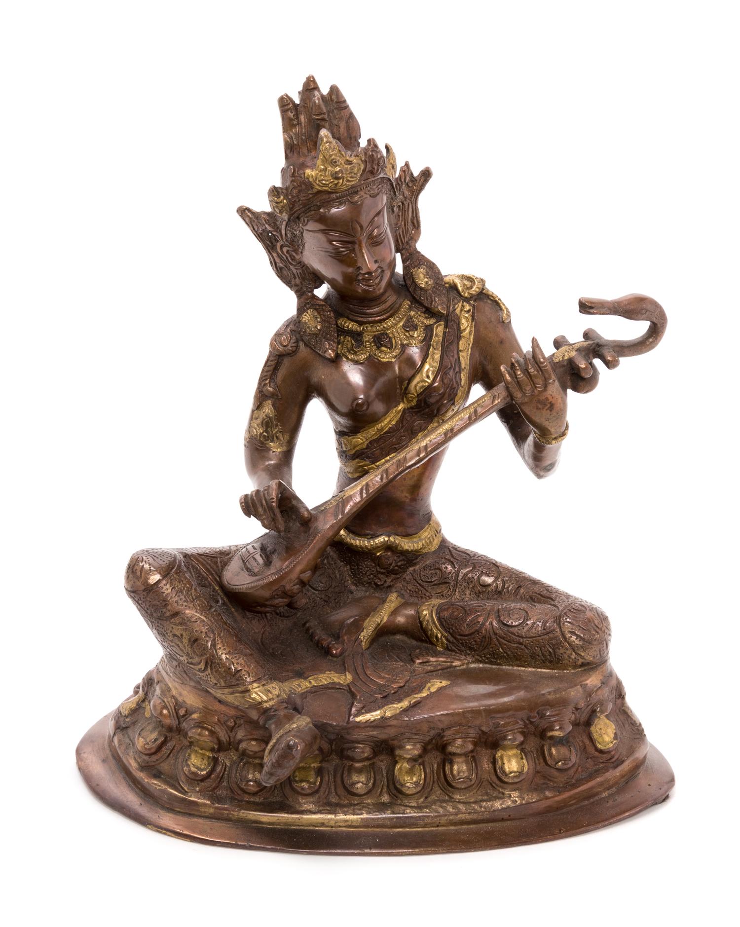 A Sino-Tibetan Parcel Gilt Bronze Figure of a Seated Deity