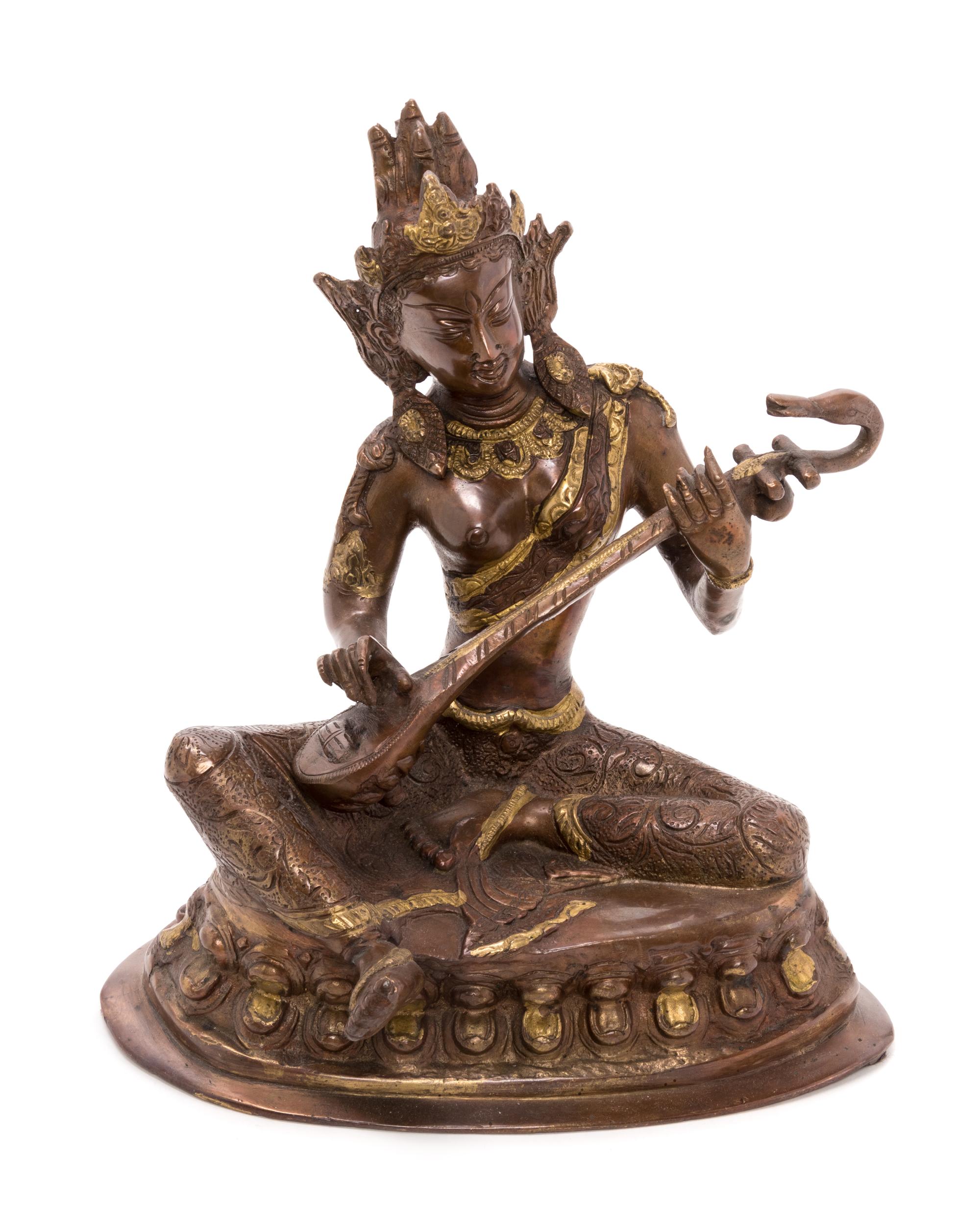 A Sino-Tibetan Parcel Gilt Bronze Figure of a Seated Deity