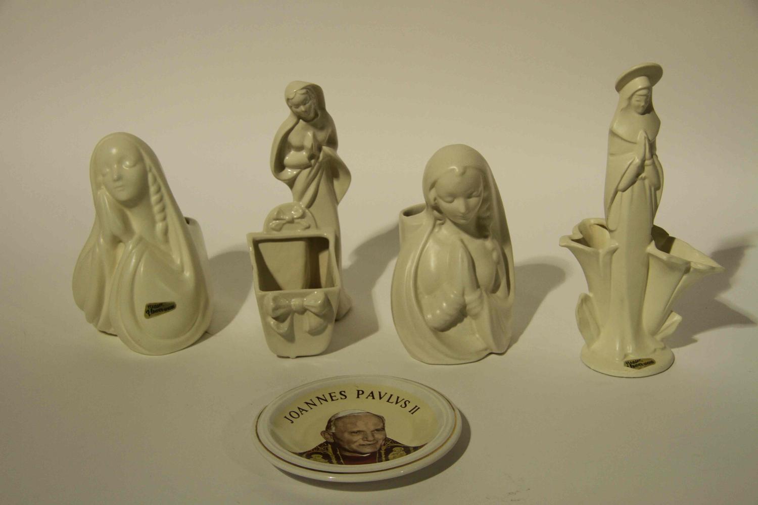 A Group of Eight Haeger Pottery Figural Vases Height of tallest 11 1/2 inches.
