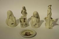 A Group of Eight Haeger Pottery Figural Vases Height of tallest 11 1/2 inches.