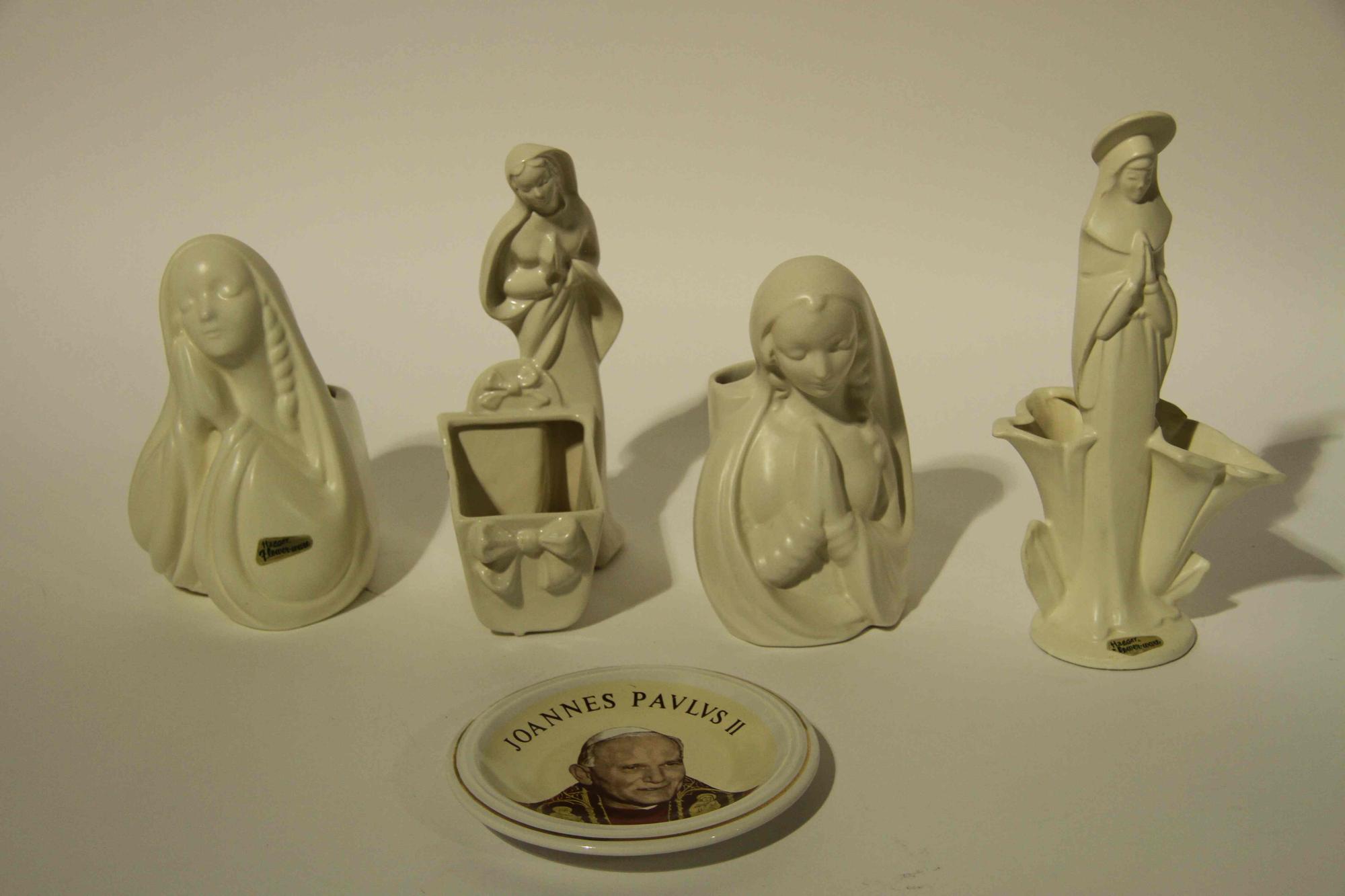 A Group of Eight Haeger Pottery Figural Vases Height of tallest 11 1/2 inches.
