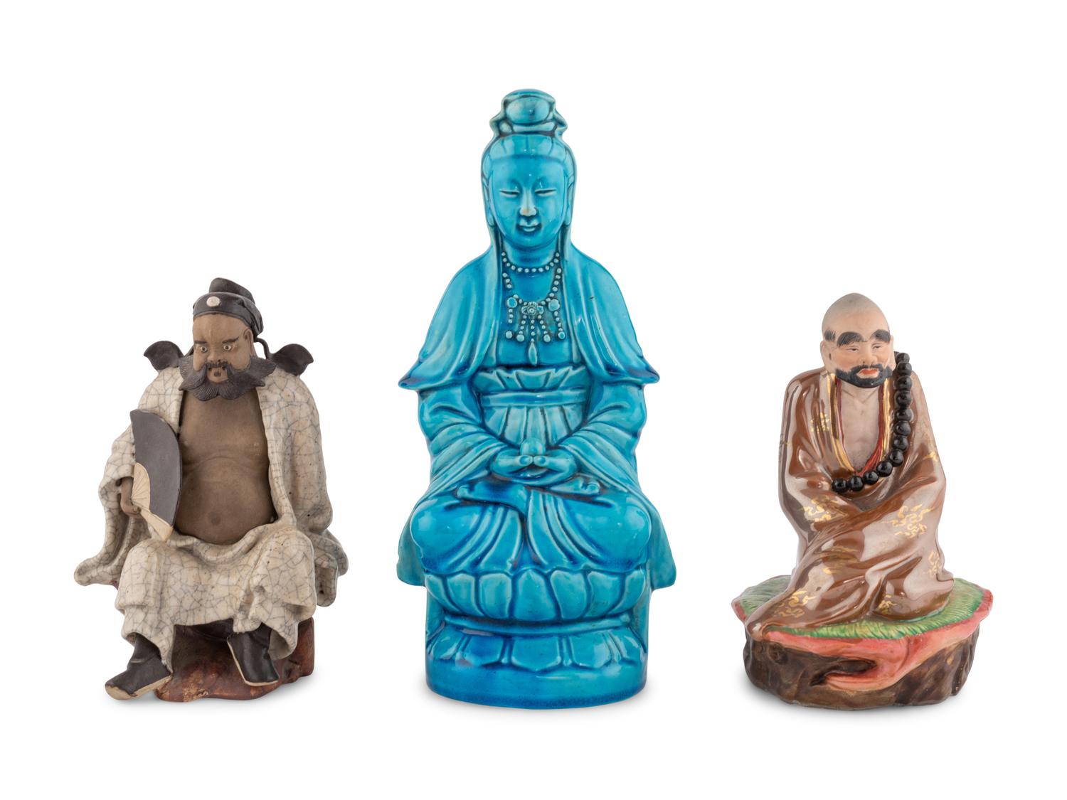 Three Chinese Porcelain and Stoneware Figures of Immortals