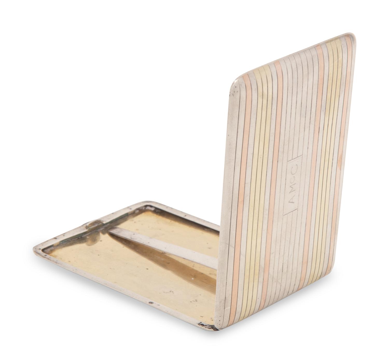 An American Silver and 14-Karat Gold Cigarette Case