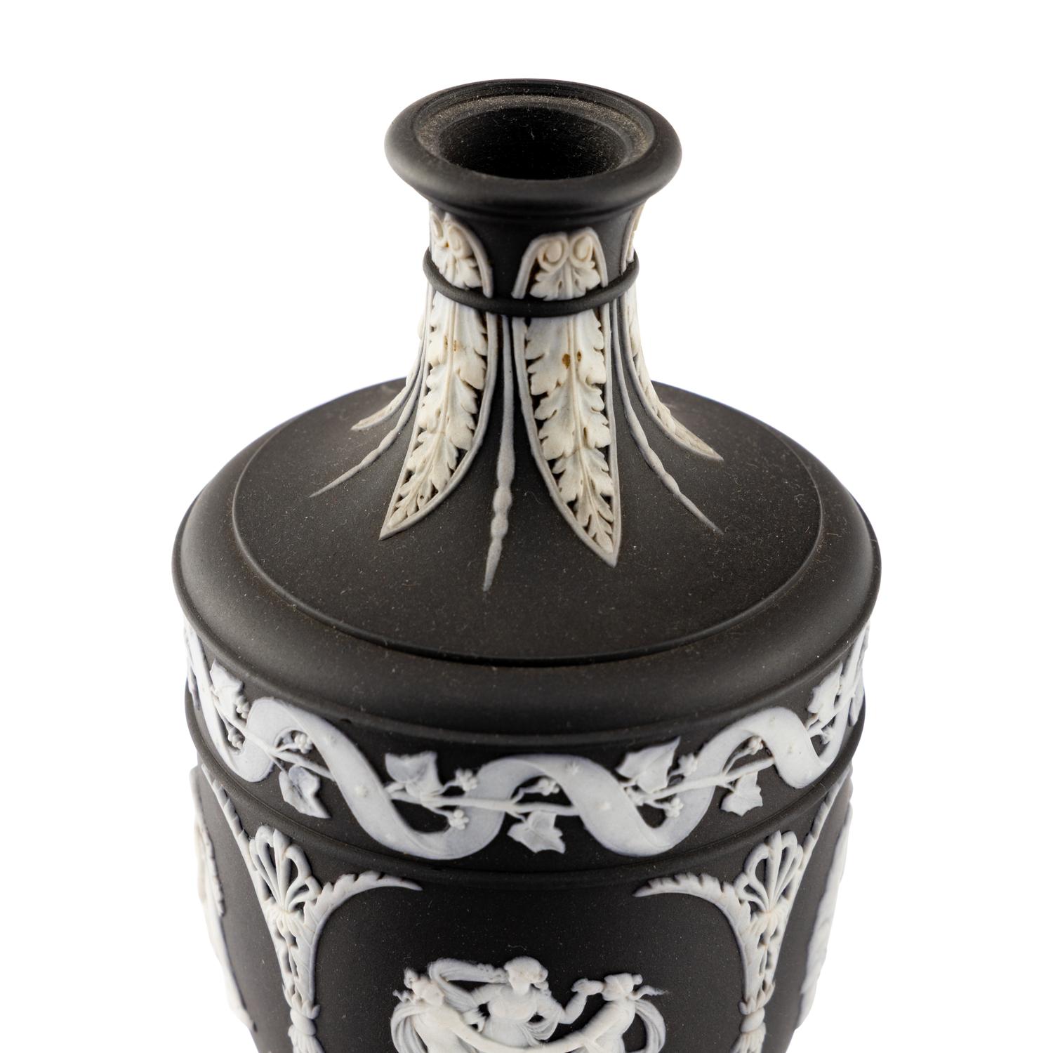 A Pair of Wedgwood Black Jasperware Urns