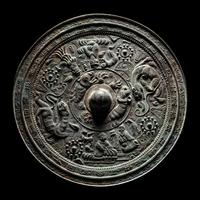 Two Chinese Archaic Bronze Mirrors