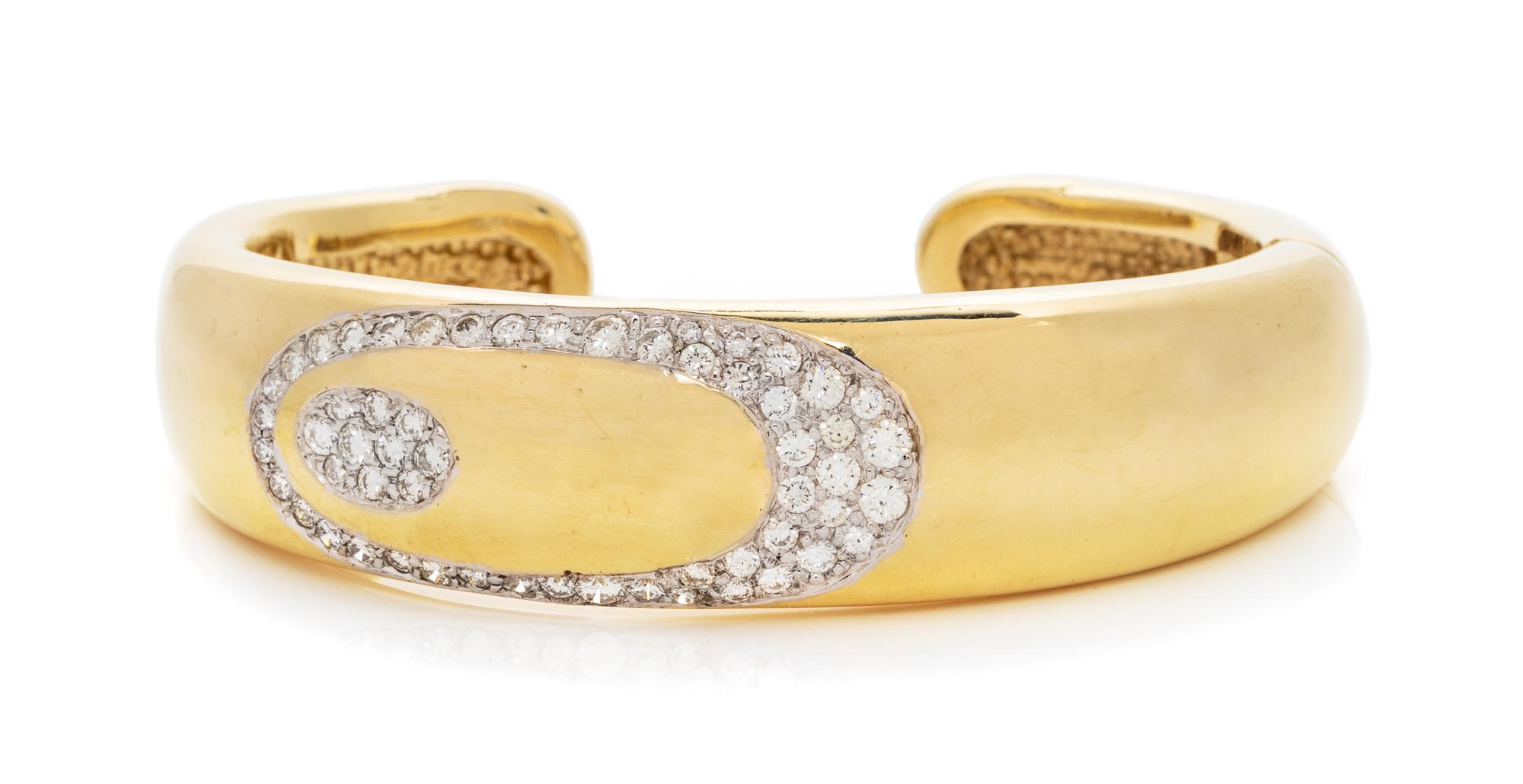 A 14 Karat Yellow Gold and Diamond Cuff Bracelet, 27.00 dwts.