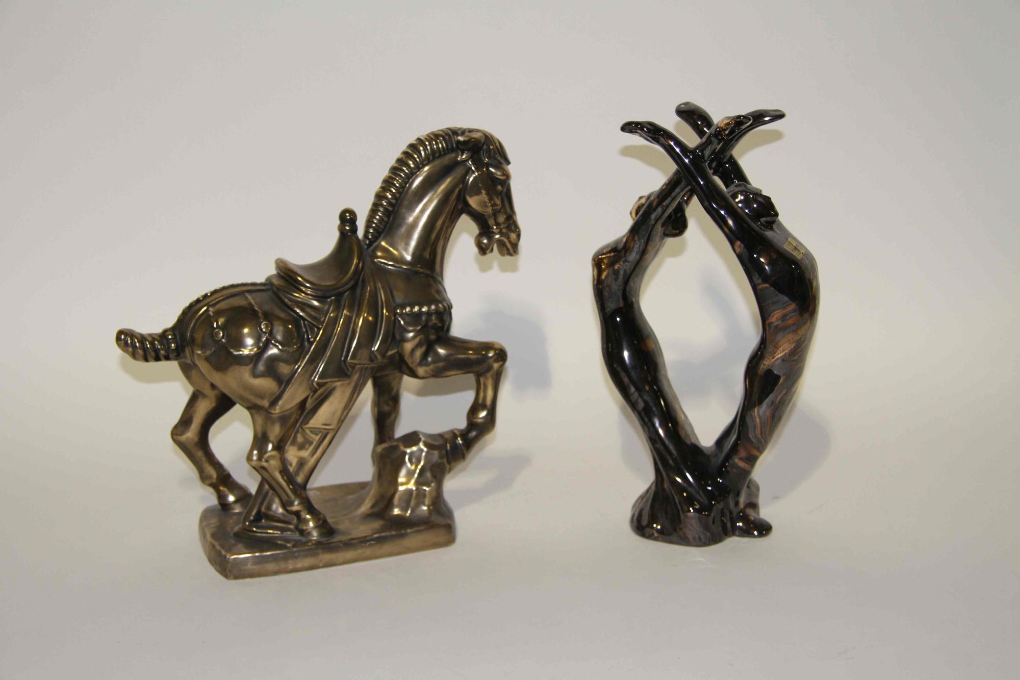 A Group of Five Haeger Pottery Figures Height of tallest 16 inches.