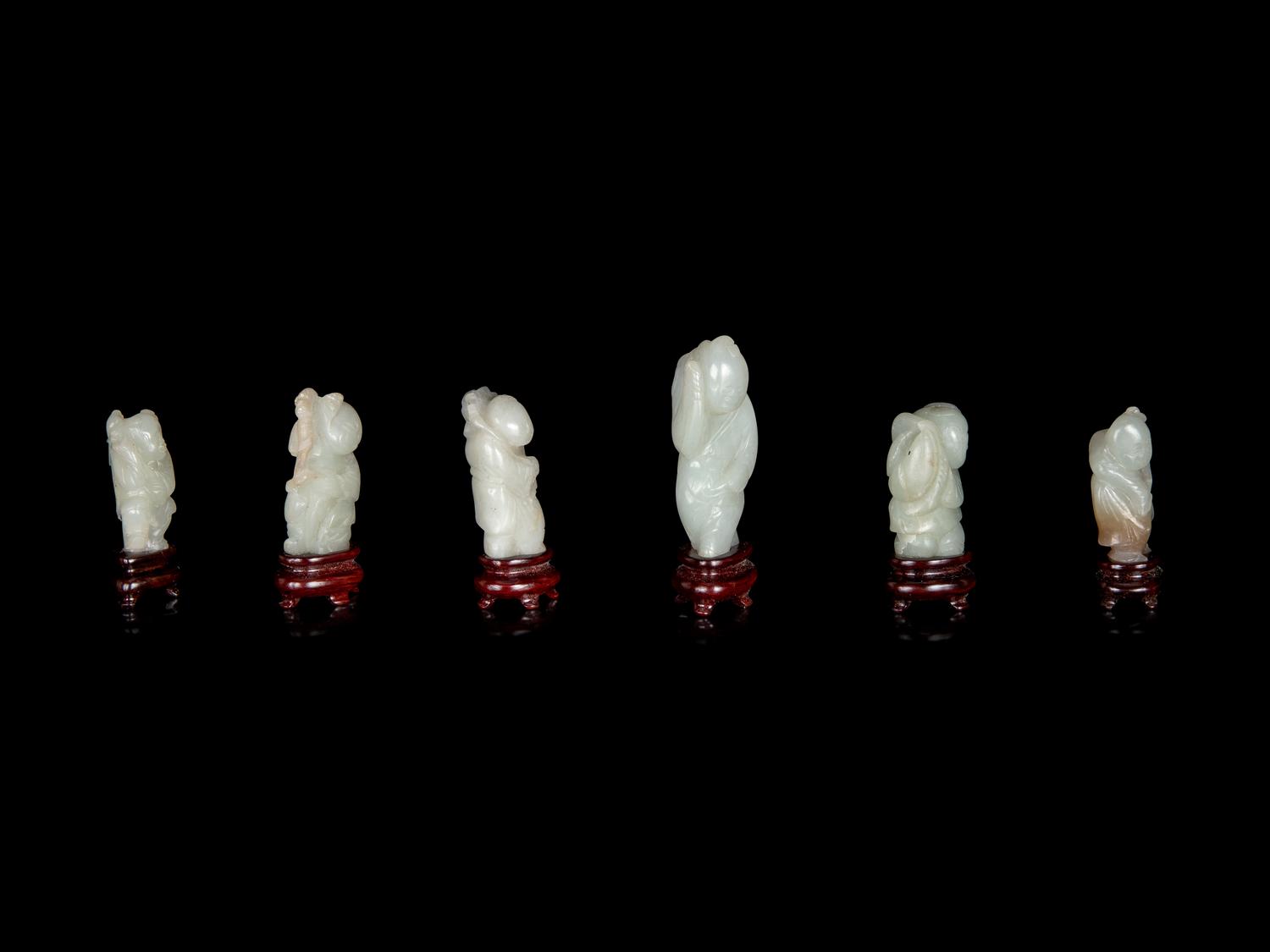 Six Chinese Carved Celadon Jade Figures of Boys