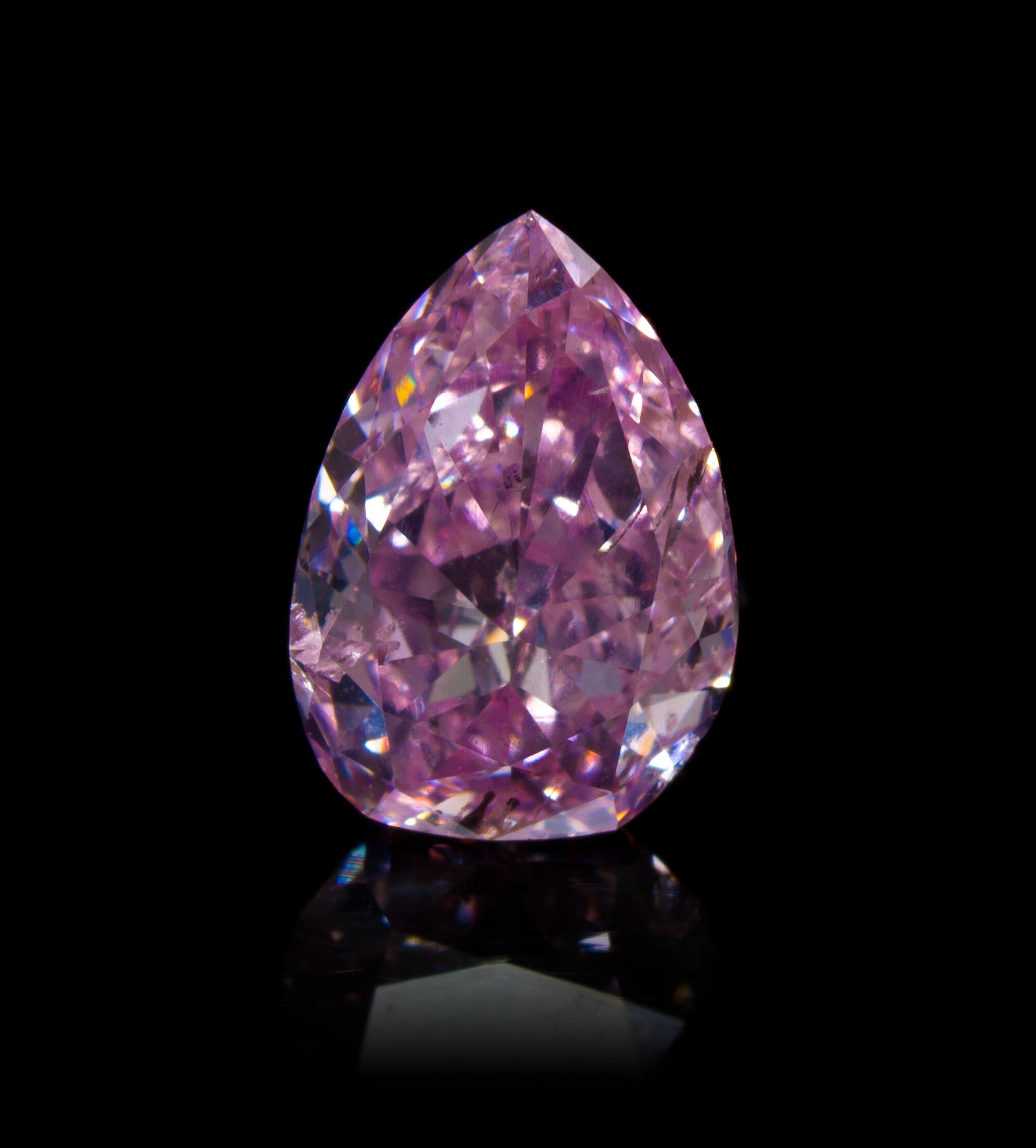 A 0.88 Carat Pear Shape Fancy Intense Purplish Pink Diamond,