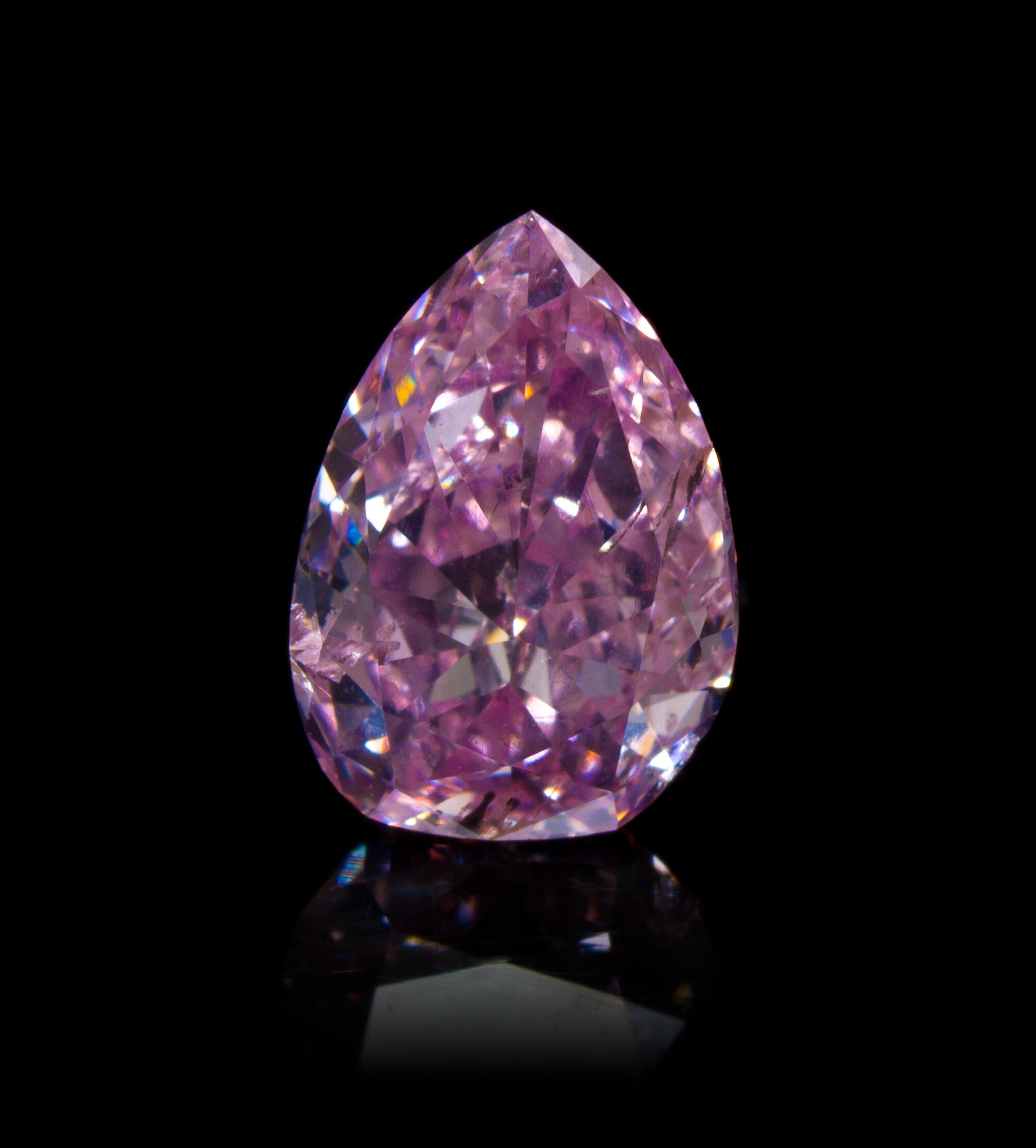 A 0.88 Carat Pear Shape Fancy Intense Purplish Pink Diamond,