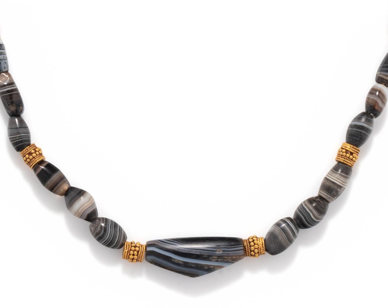 A Western Asiatic Agate and Gold Bead Necklace