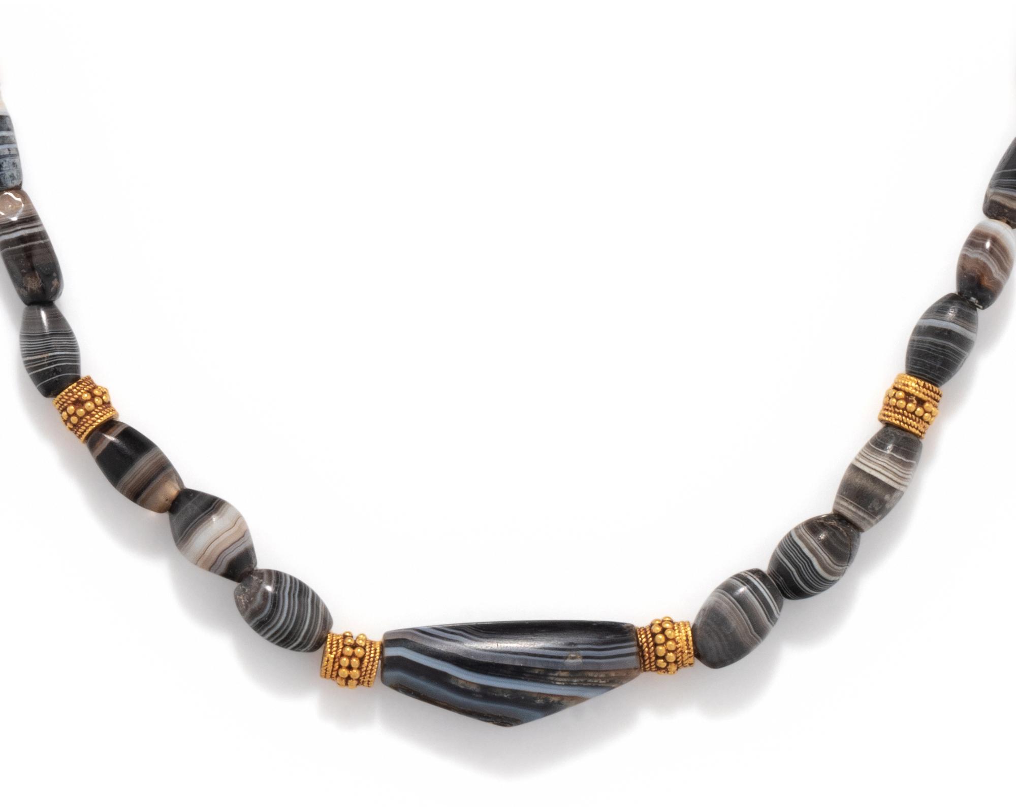 A Western Asiatic Agate and Gold Bead Necklace