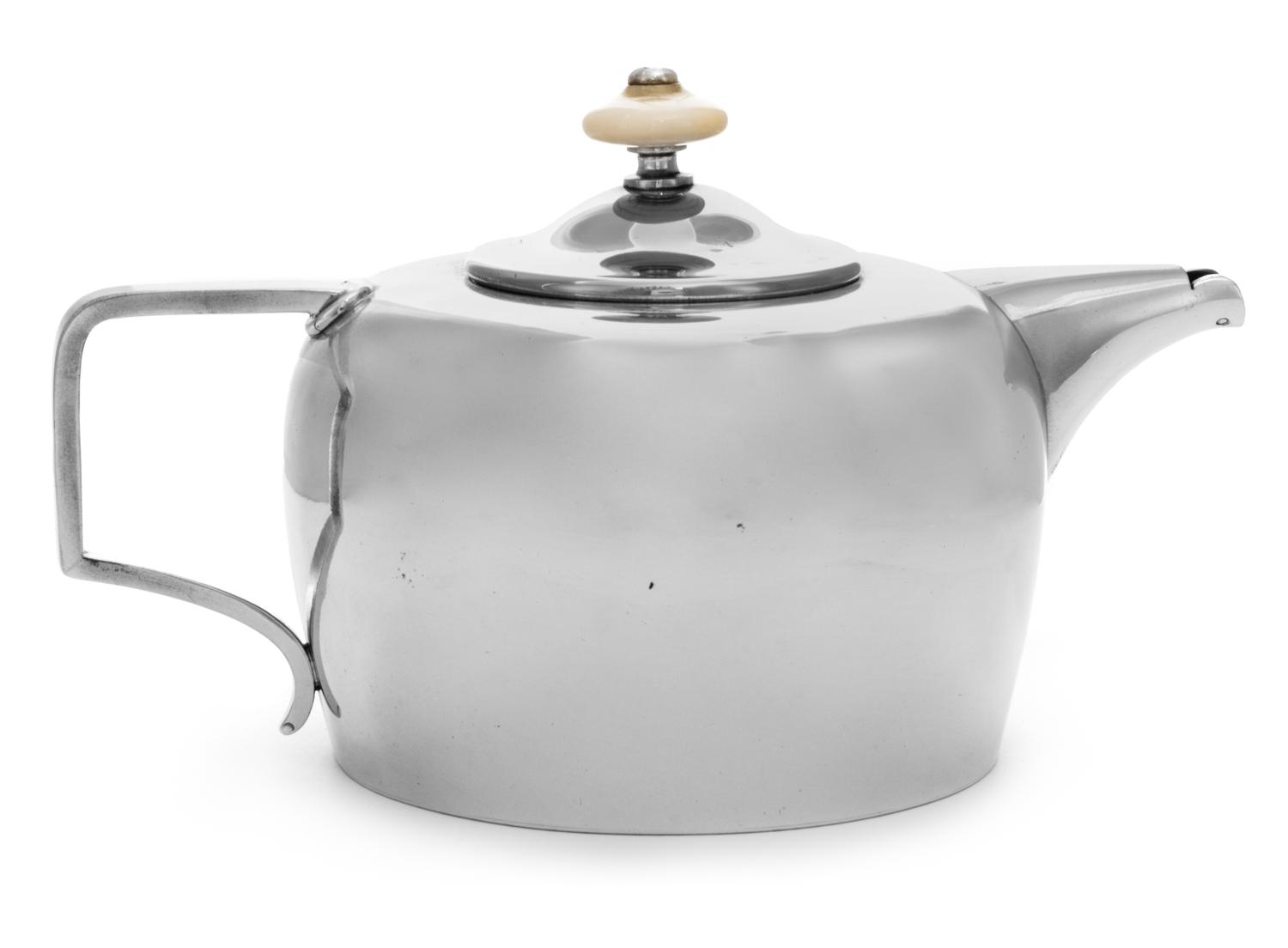A Russian Silver Teapot, , of cylindrical form, having a rounded top and a squared handle, bearing two second kokoshnik marks for Mosco