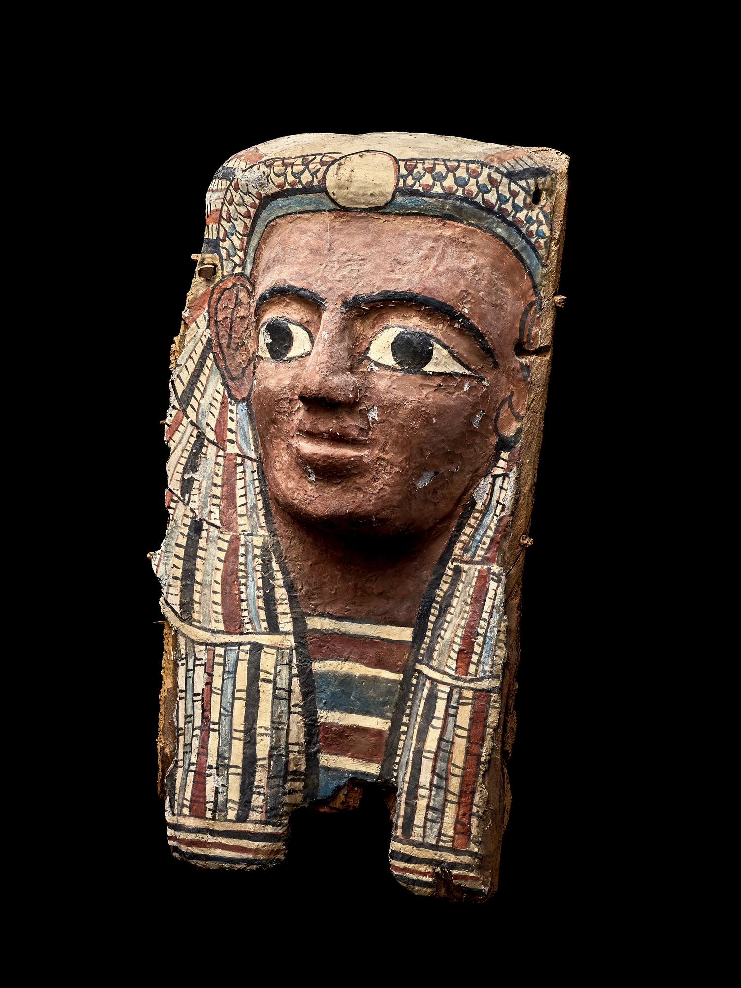 An Egyptian Painted Cartonnage Mummy Mask