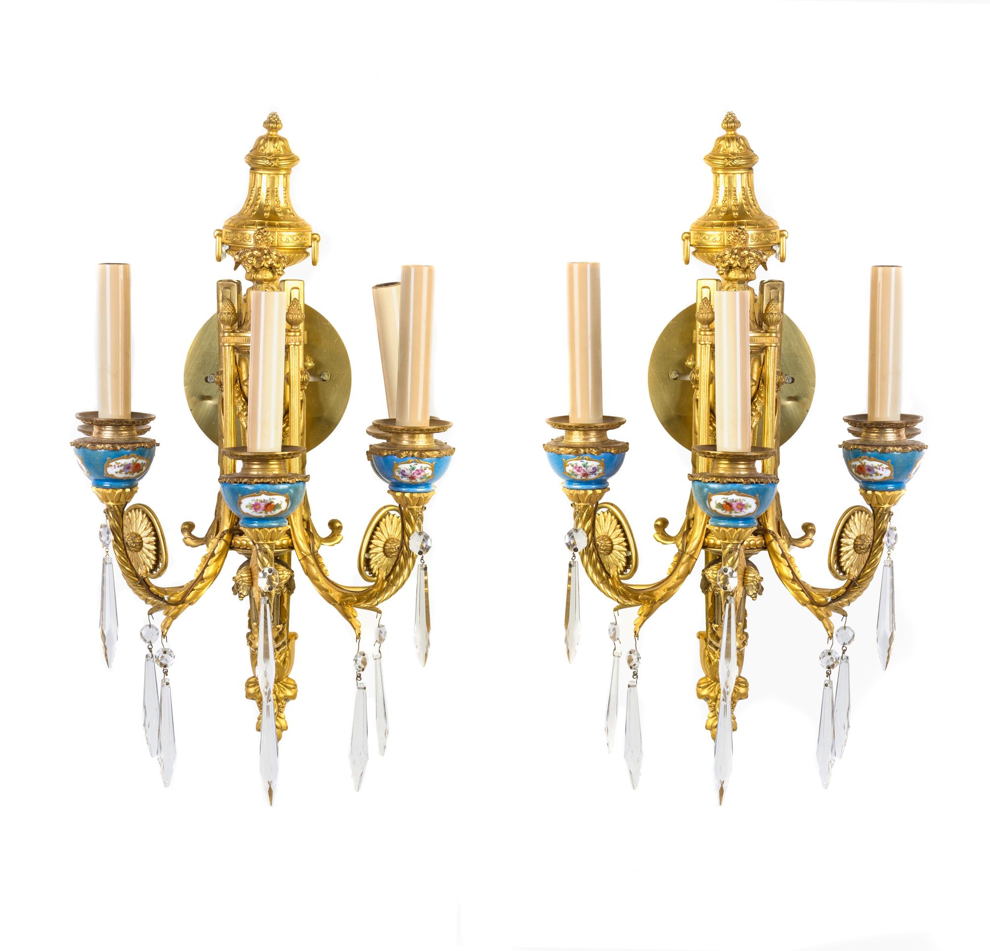 A Pair of Sevres Style Porcelain Mounted Gilt Bronze Five-Light Sconces, Height 19 1/2 inches.