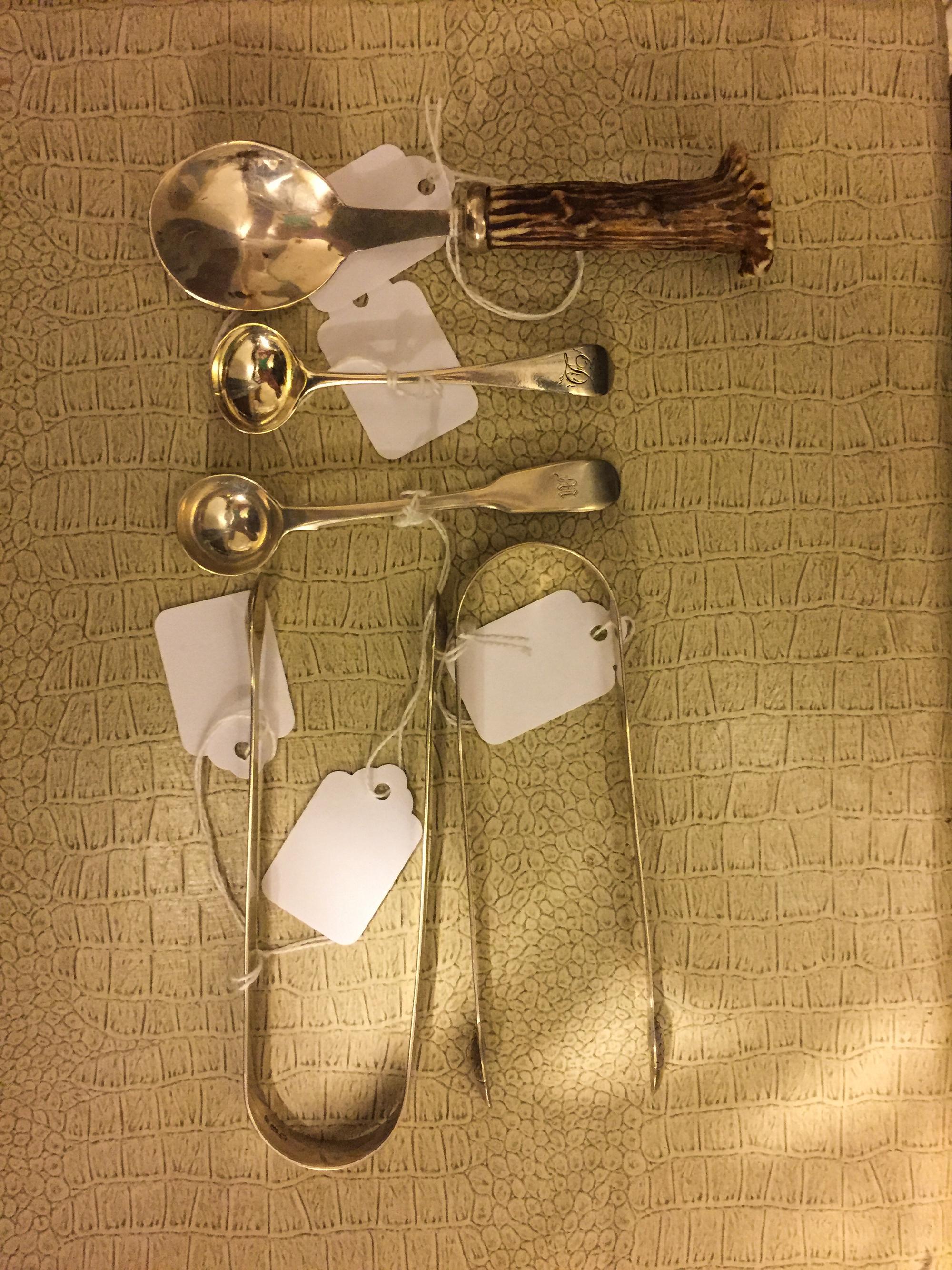 Three Georgian Silver Table Articles, Various makers and dates, London, comprising two sugar tongs and a sugar spoon, together with a V