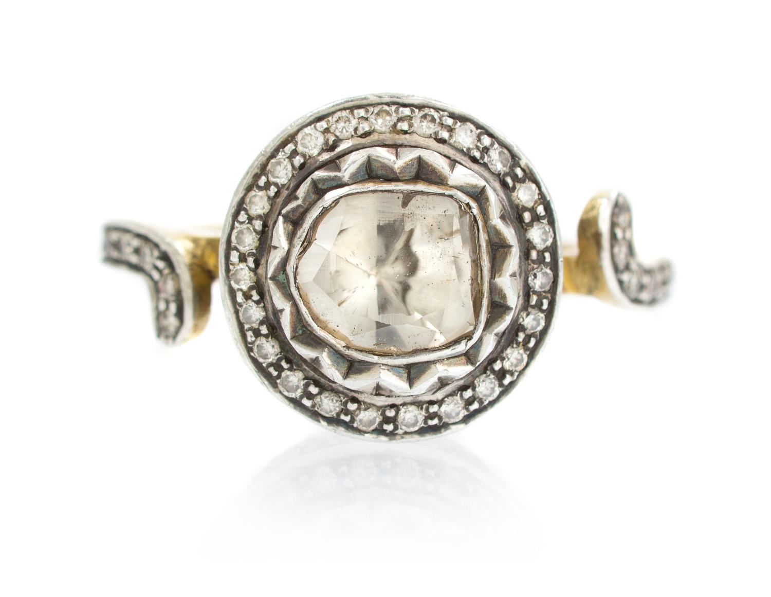 A Silver Topped Gold and Diamond Ring, 4.70 dwts.