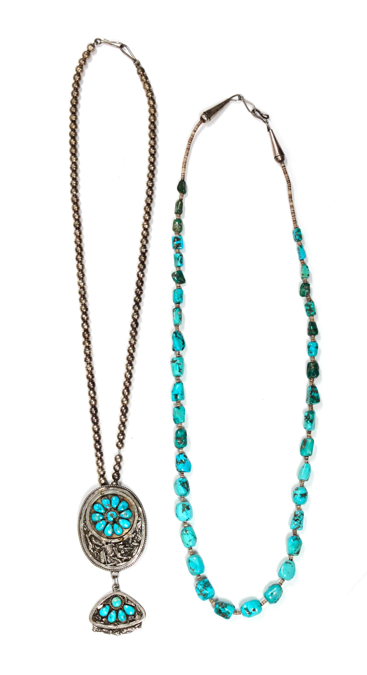 Two Southwestern Silver and Turquoise Necklaces Length of longest chain 25 inches; pendant 4 x 2 inches.