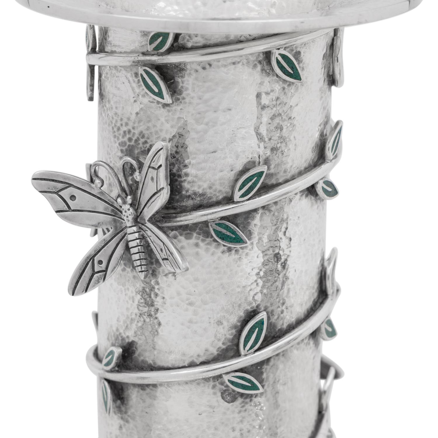 A Set of Three Mexican Silver Graduated Candlesticks