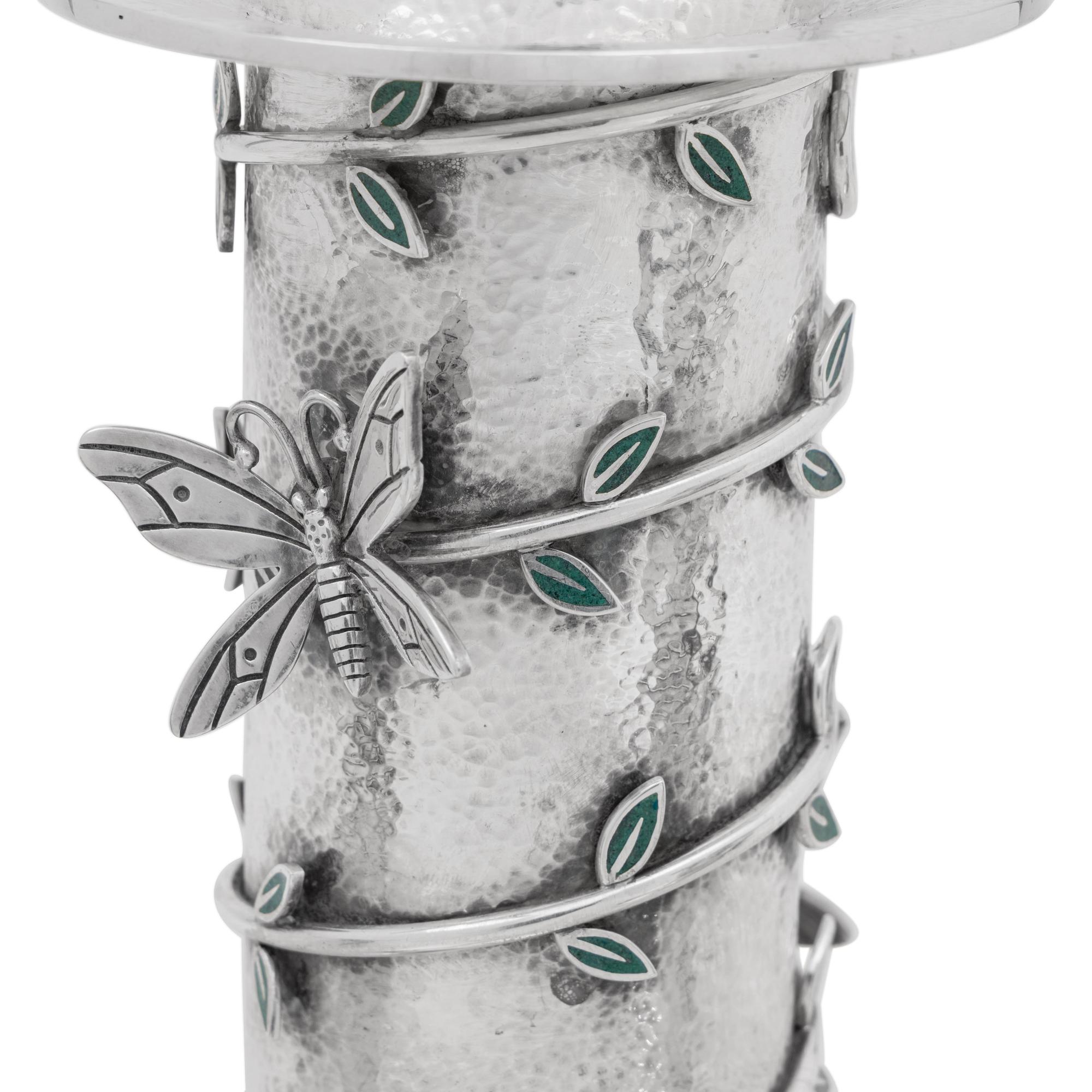 A Set of Three Mexican Silver Graduated Candlesticks