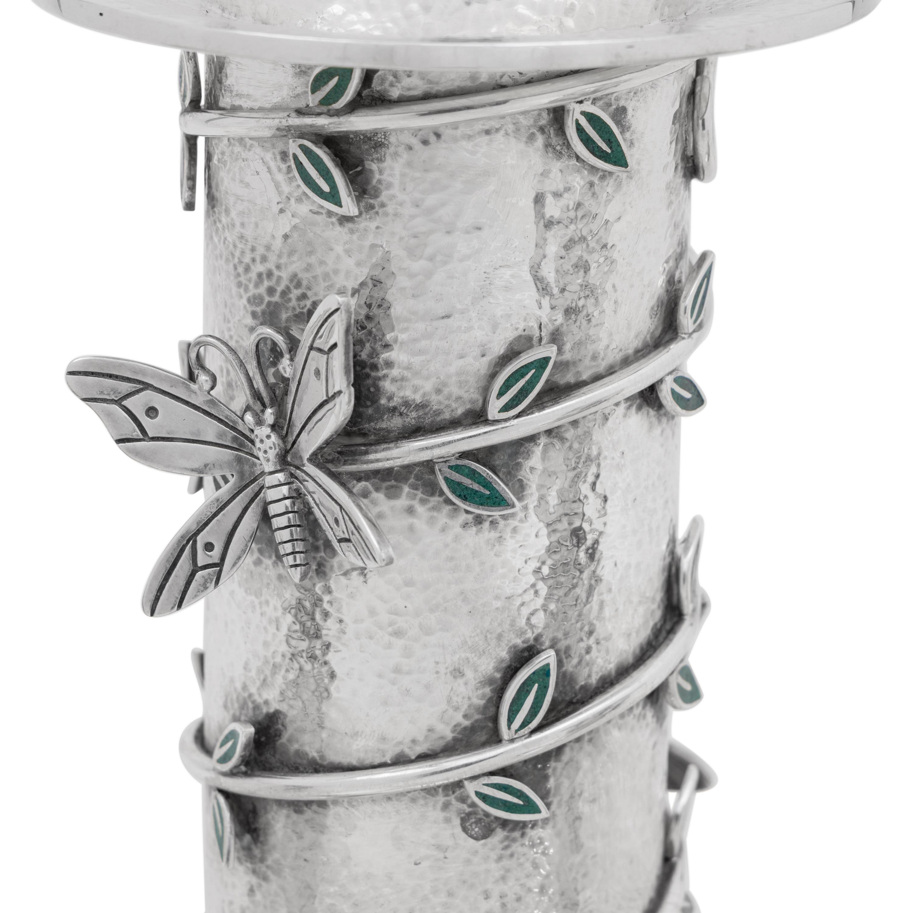 A Set of Three Mexican Silver Graduated Candlesticks